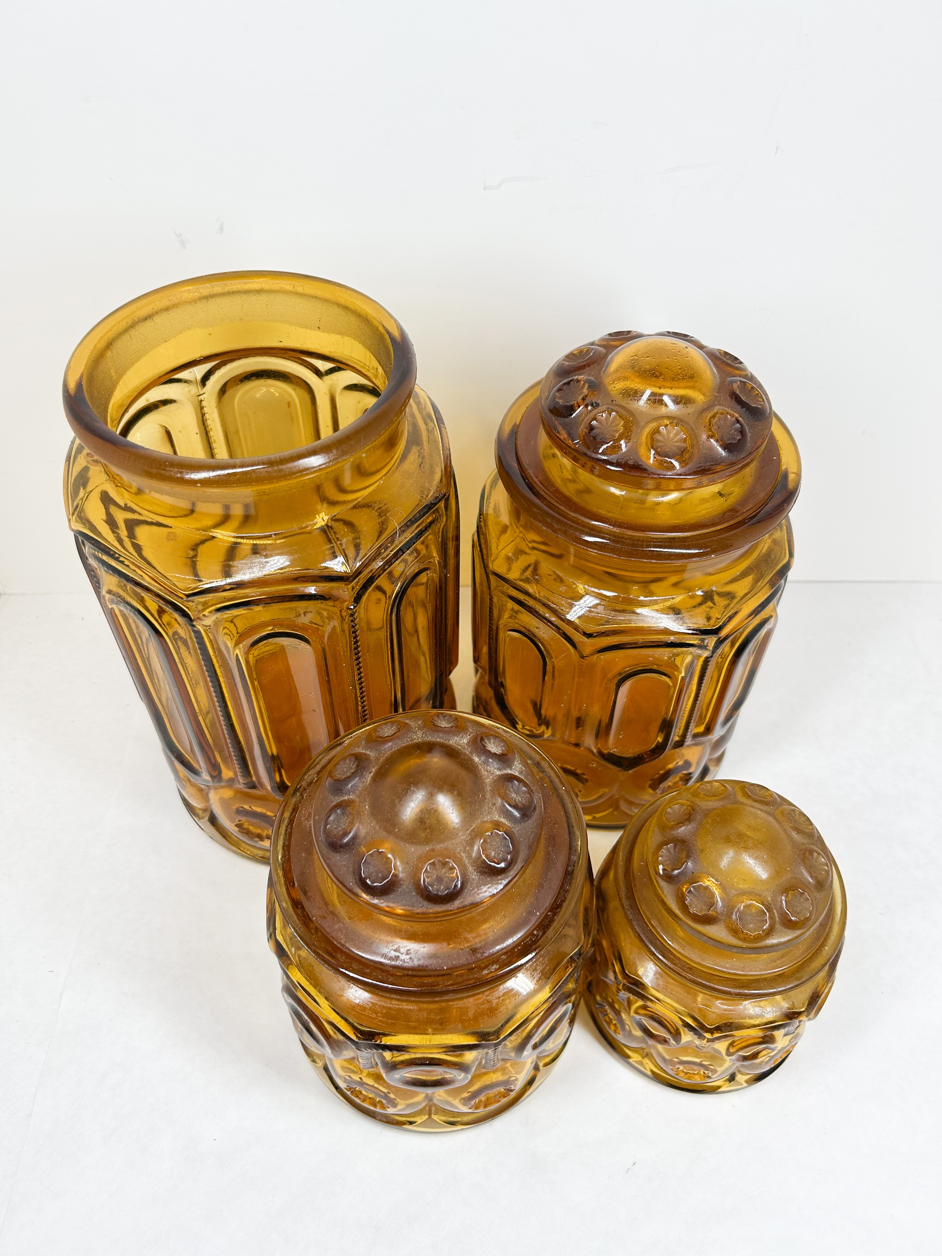 AMBER MOON AND STAR GLASS CANISTERS