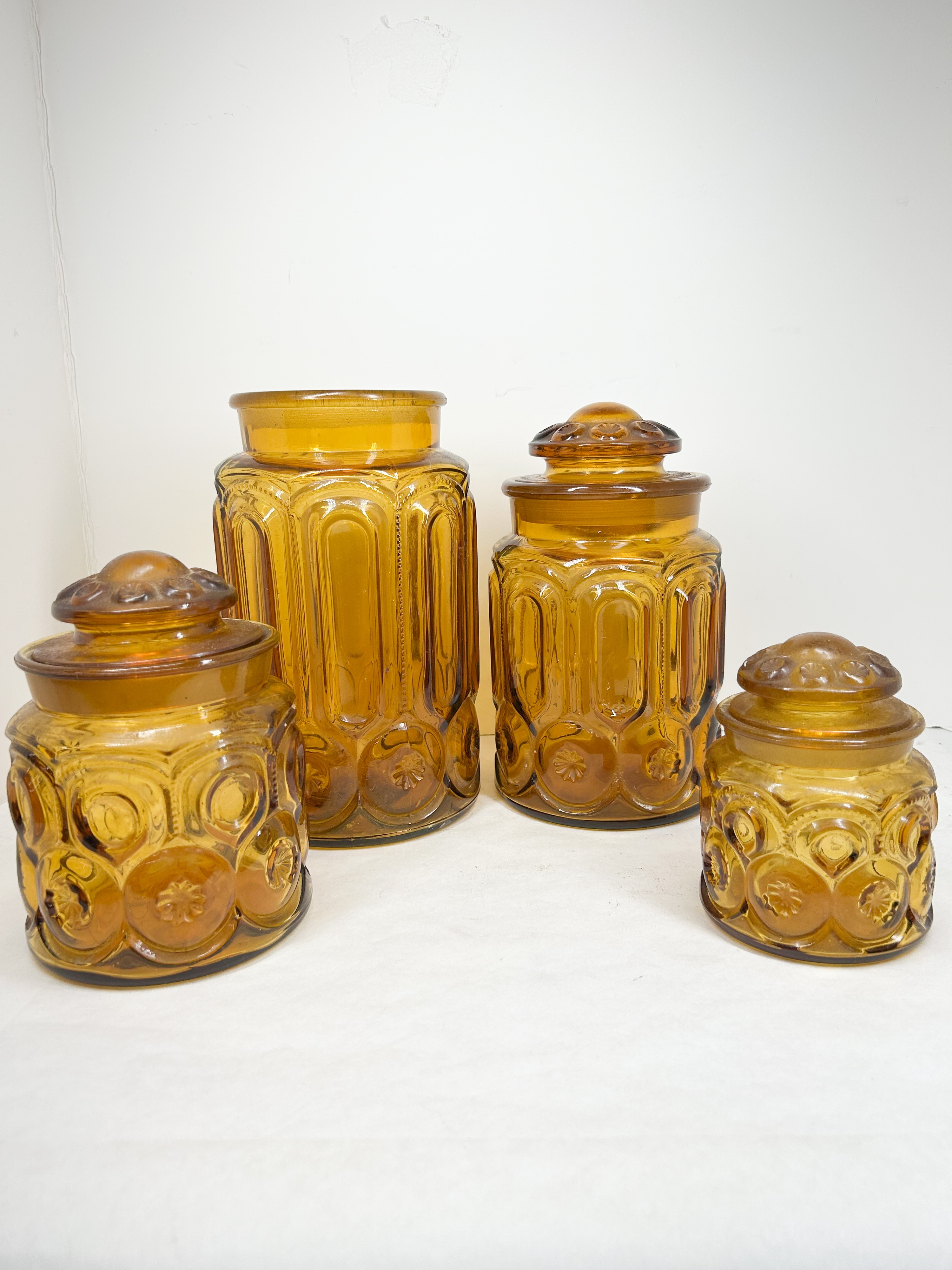 AMBER MOON AND STAR GLASS CANISTERS