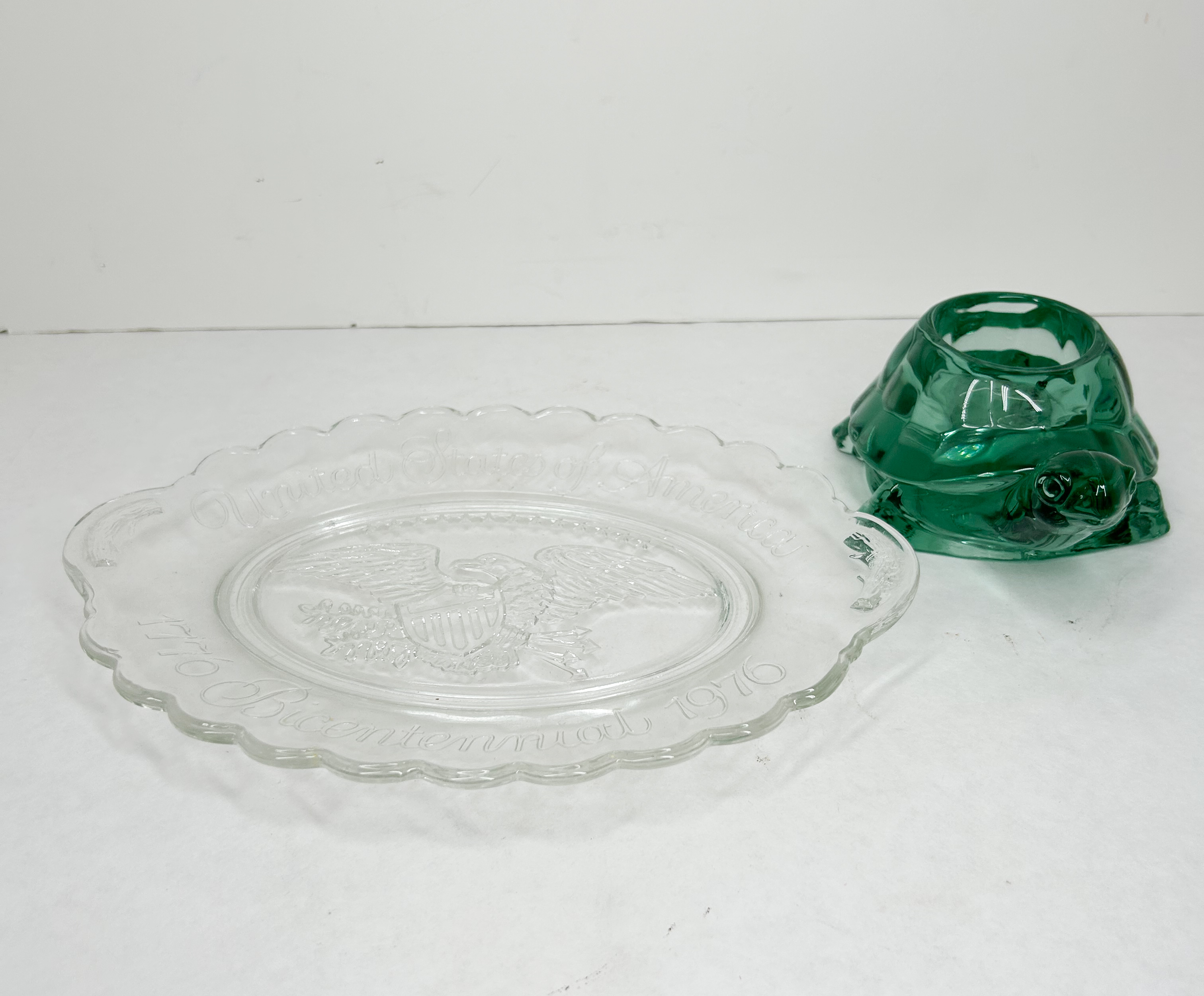 TWO PIECES OF PRESSED GLASS, 1976 AND LATER