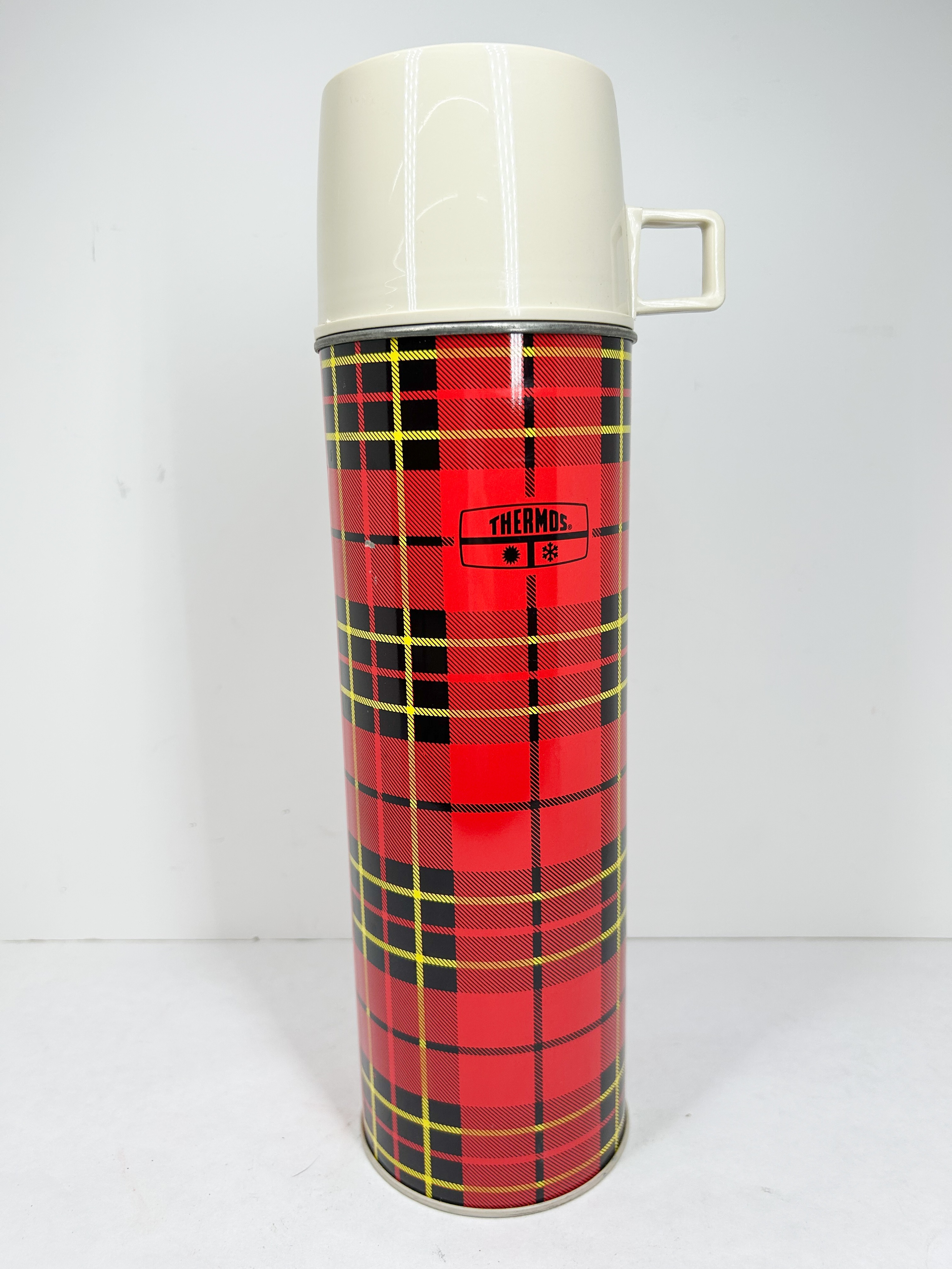 THERMOS RED TARTAN METAL FLASK, CIRCA 1964