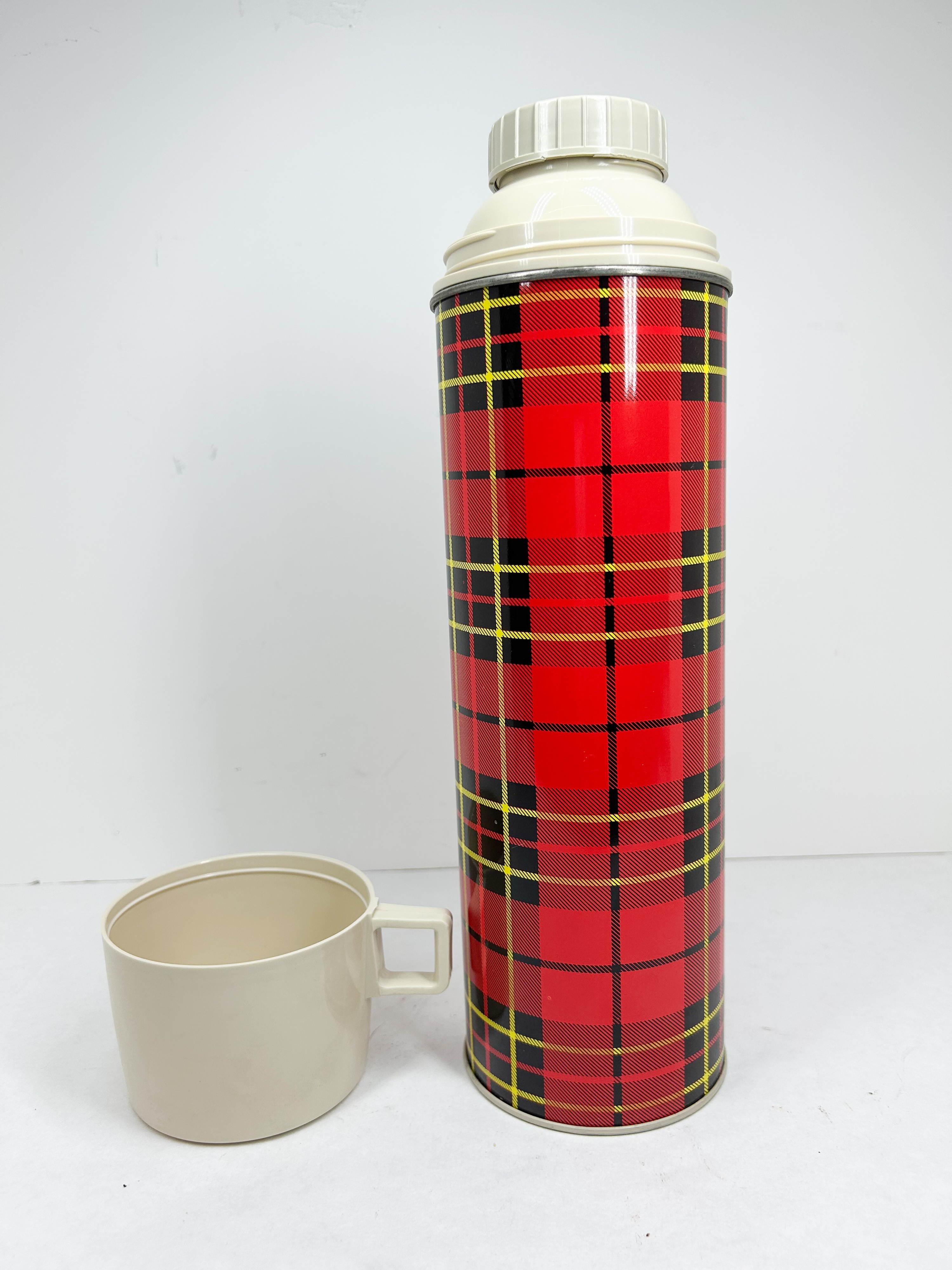 THERMOS RED TARTAN METAL FLASK, CIRCA 1964