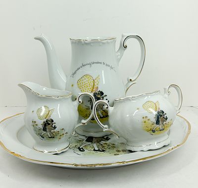 HOLLY HOBBIE PORCELAIN TEA SET 1973. Japanese porcelain tea set featuring Holly Hobbie 