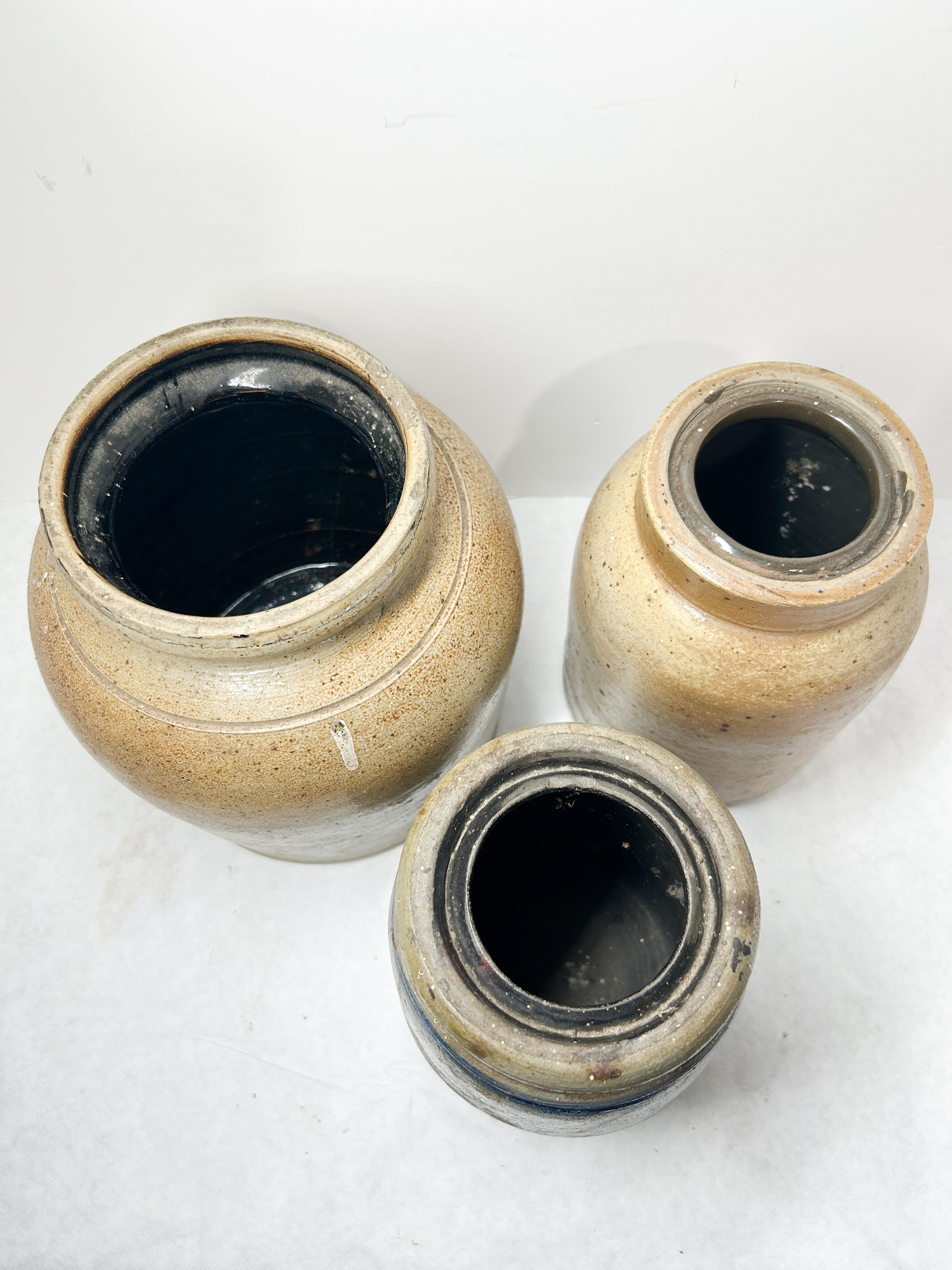 THREE AMERICAN SALT-GLAZED STONEWARE JARS