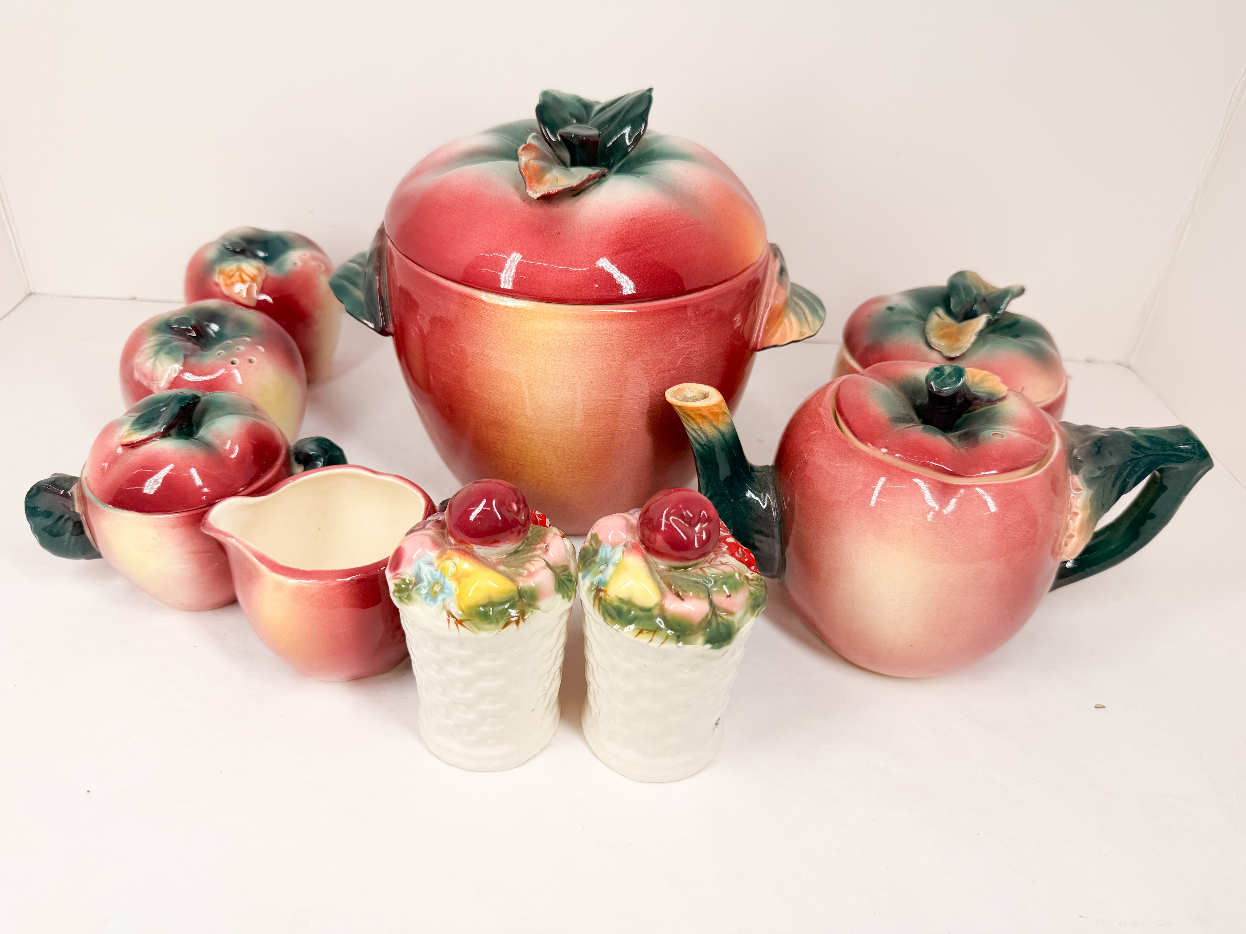SET OF FIGURAL FRUIT-FORM EARTHENWARE TABLEWARE AND KITCHENWARE