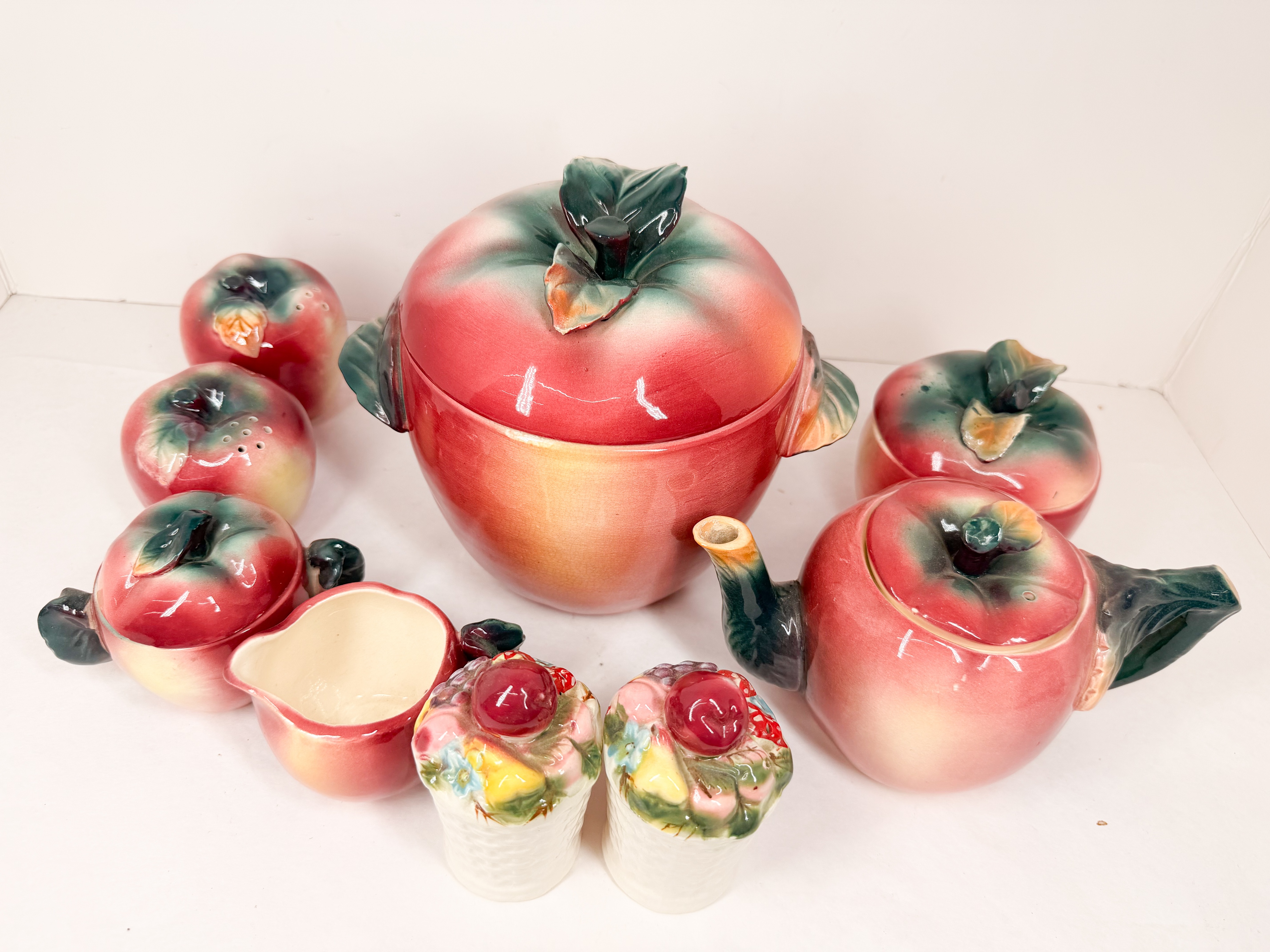 SET OF FIGURAL FRUIT-FORM EARTHENWARE TABLEWARE AND KITCHENWARE