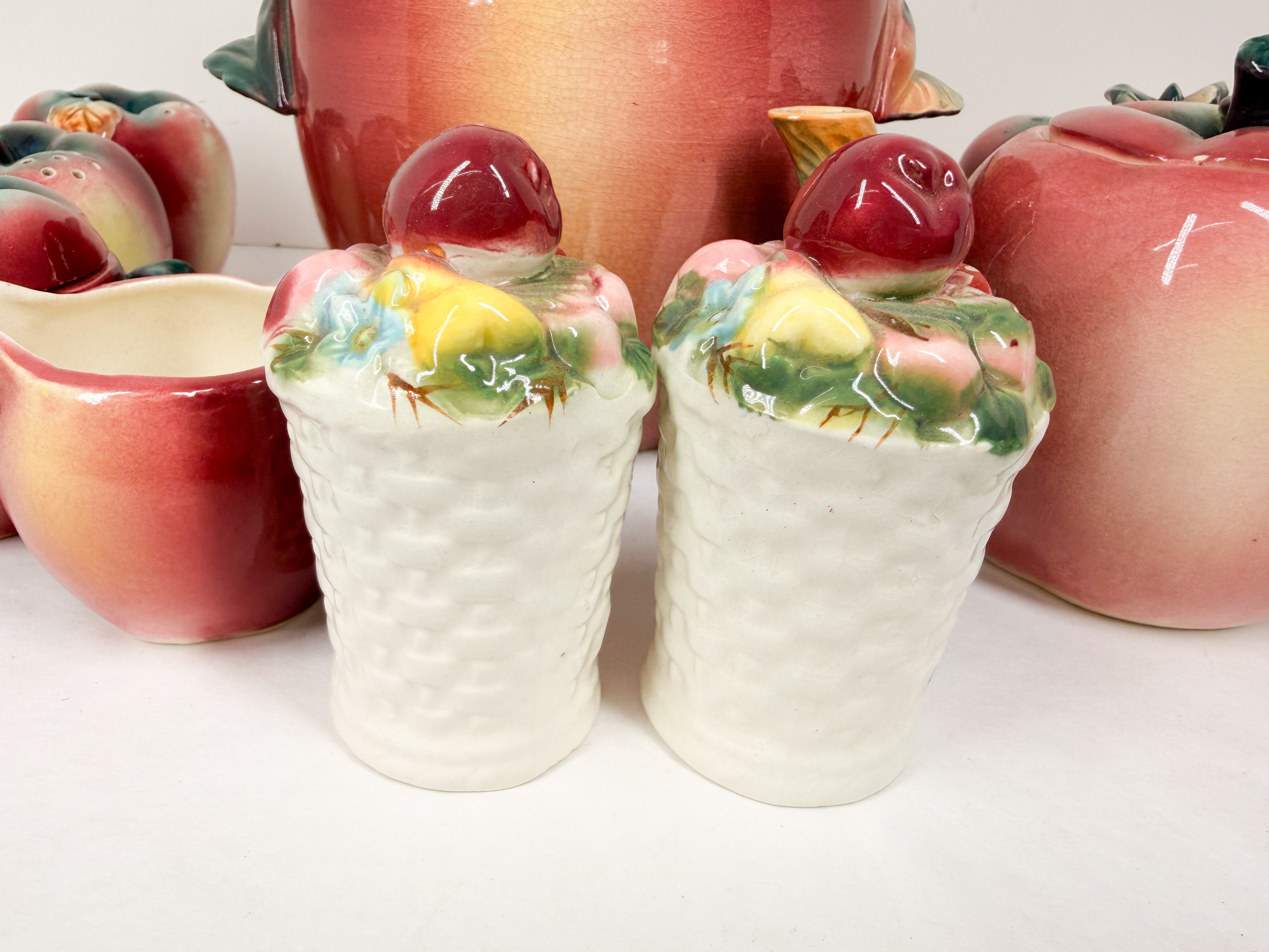 SET OF FIGURAL FRUIT-FORM EARTHENWARE TABLEWARE AND KITCHENWARE