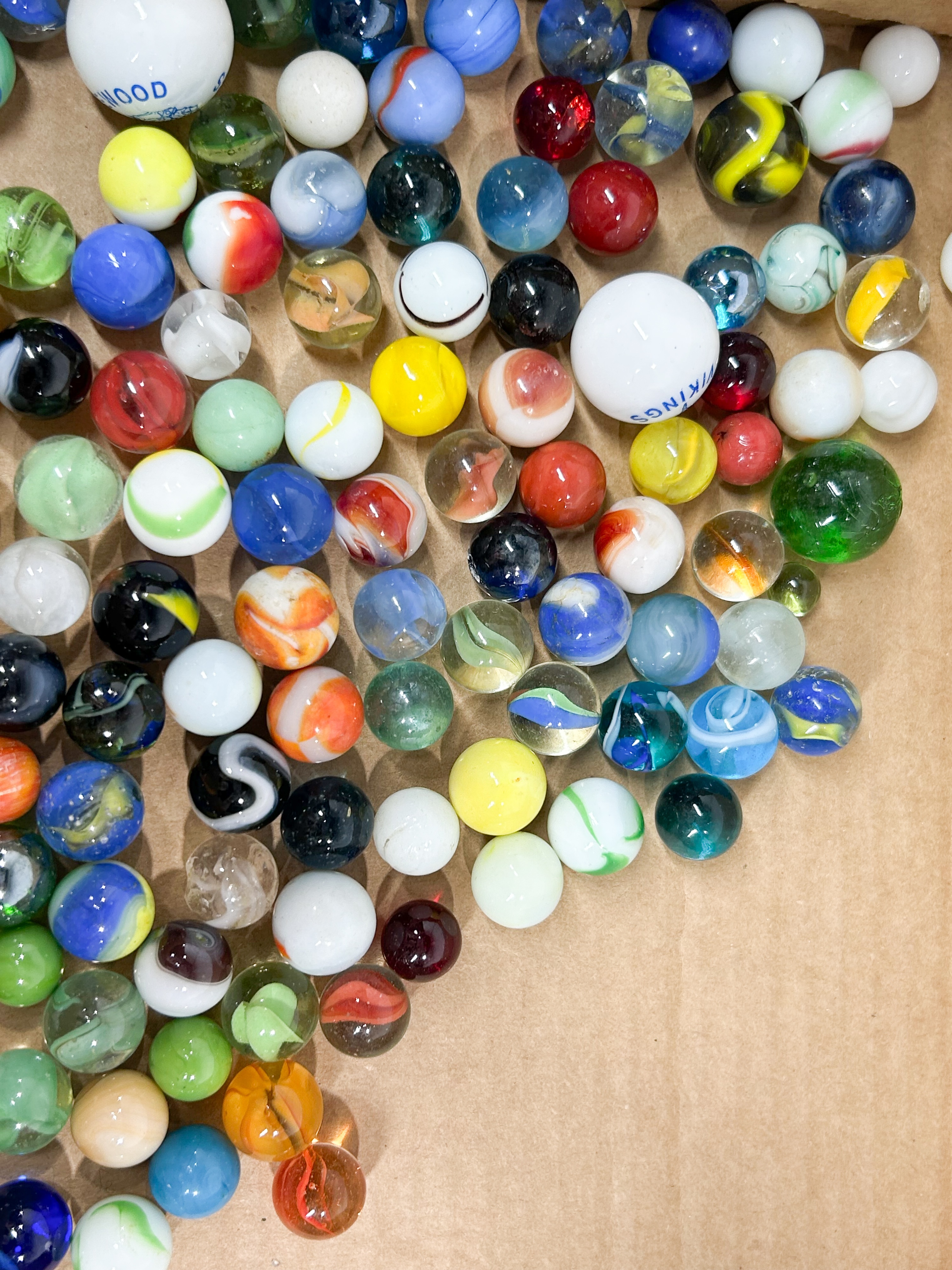 ASSORTED GLASS MARBLES IN MASON JAR