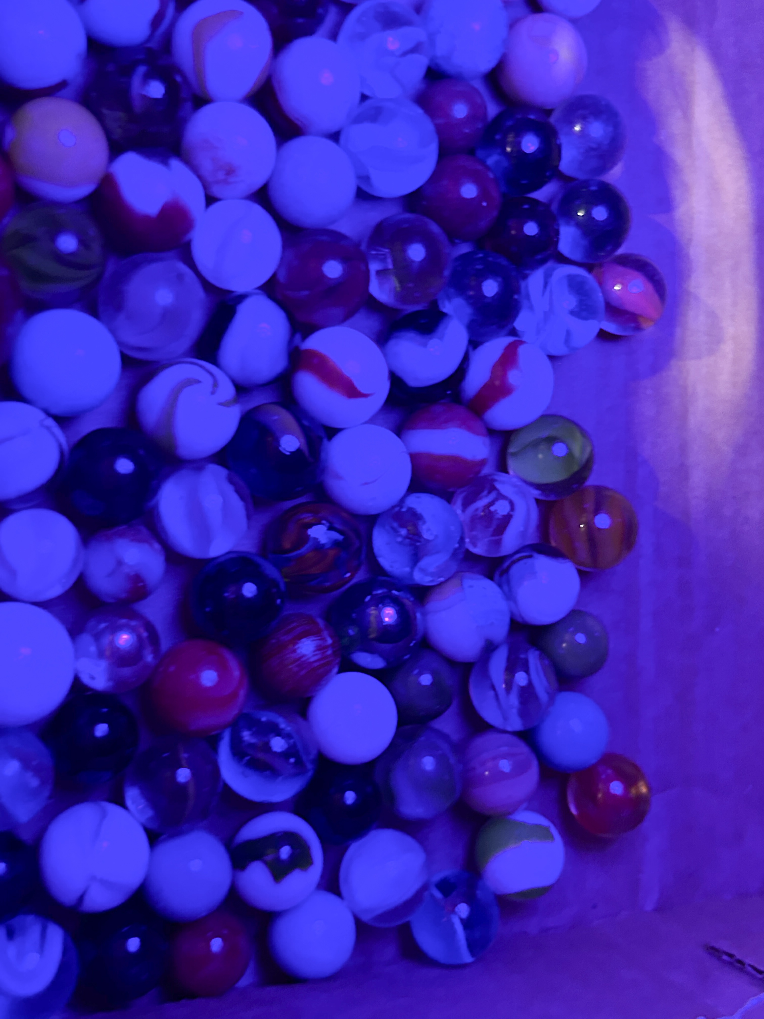 ASSORTED GLASS MARBLES IN MASON JAR