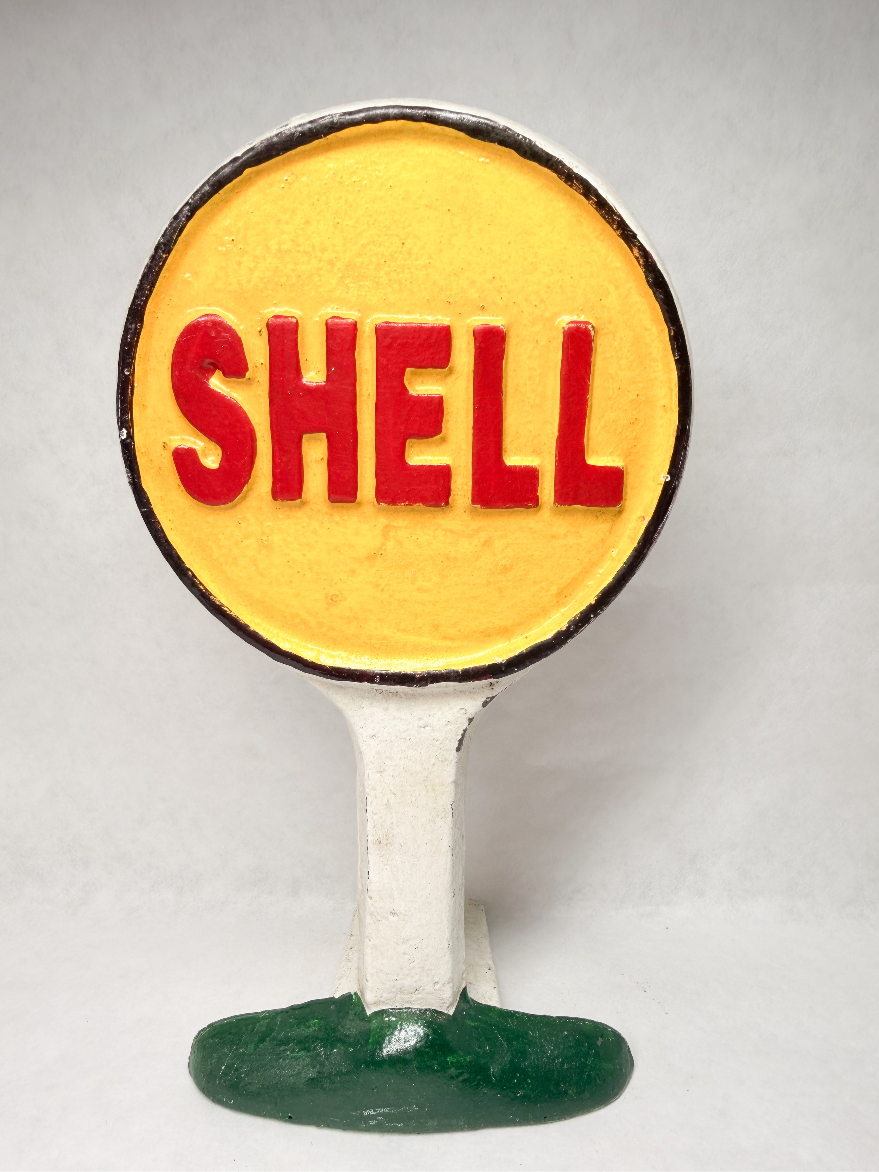 SHELL CAST IRON DOORSTOP