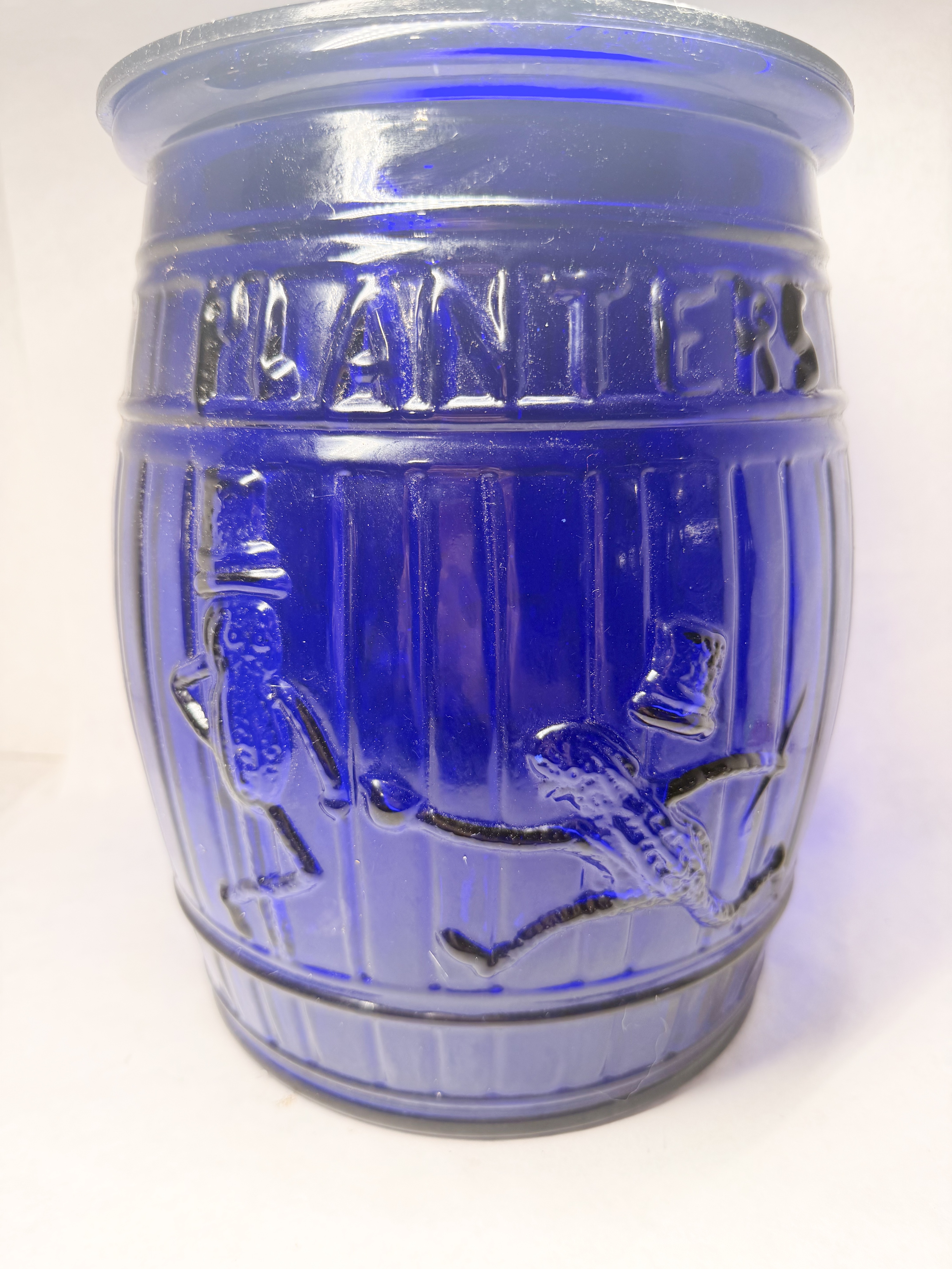 PLANTERS COBALT BLUE GLASS BARREL JAR