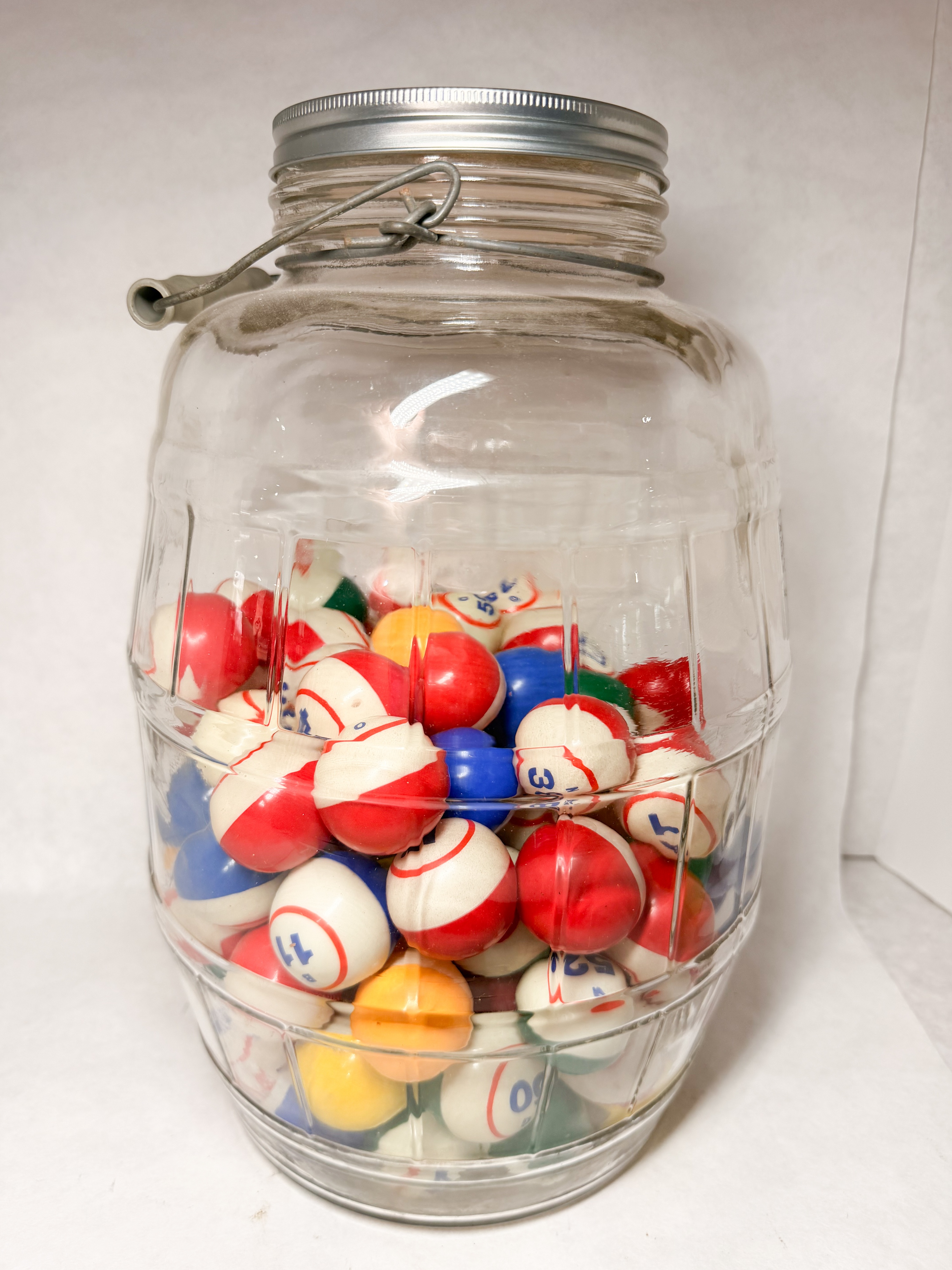 GLASS PICKLE JAR WITH BINGO BALLS