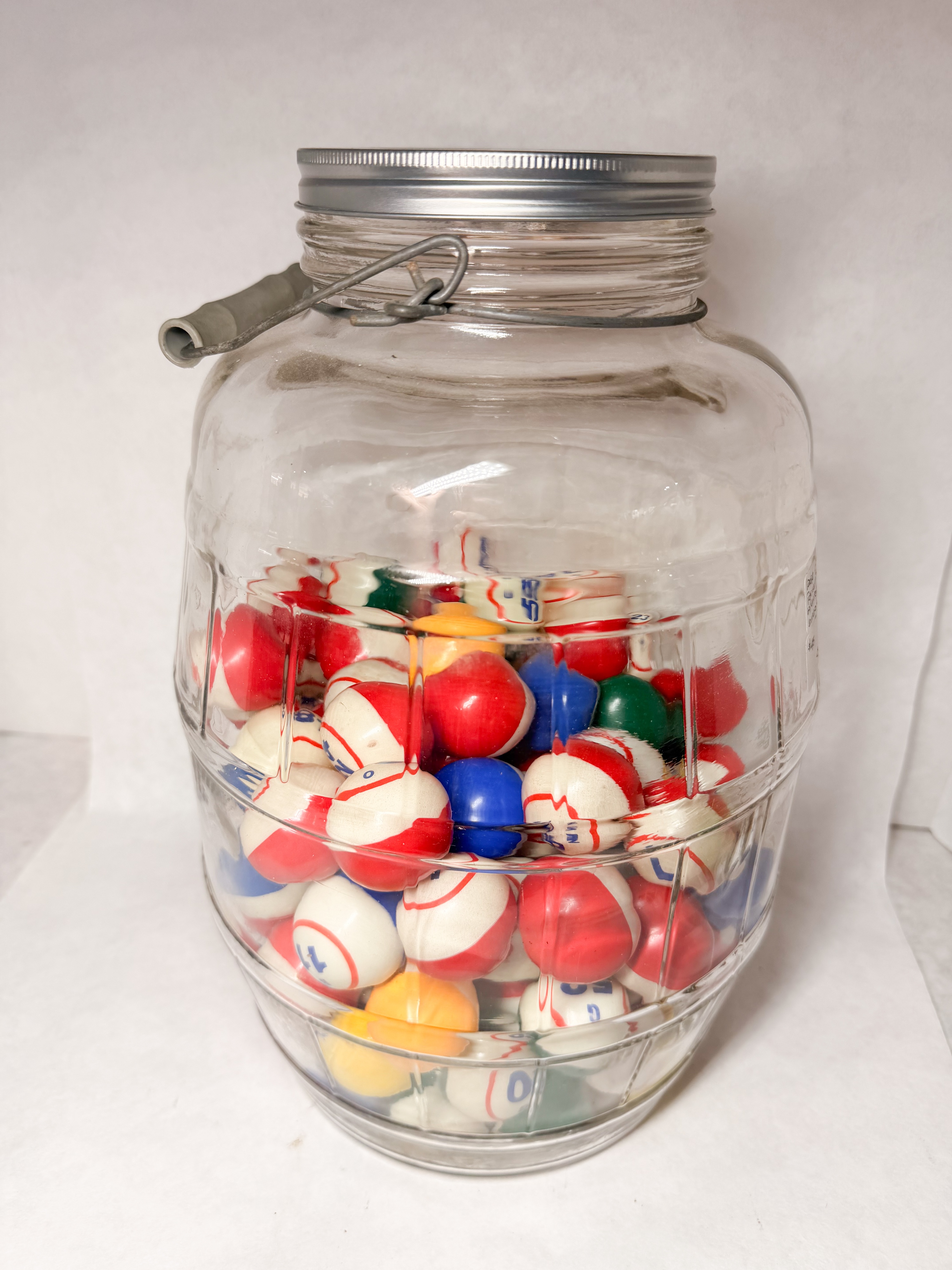 GLASS PICKLE JAR WITH BINGO BALLS