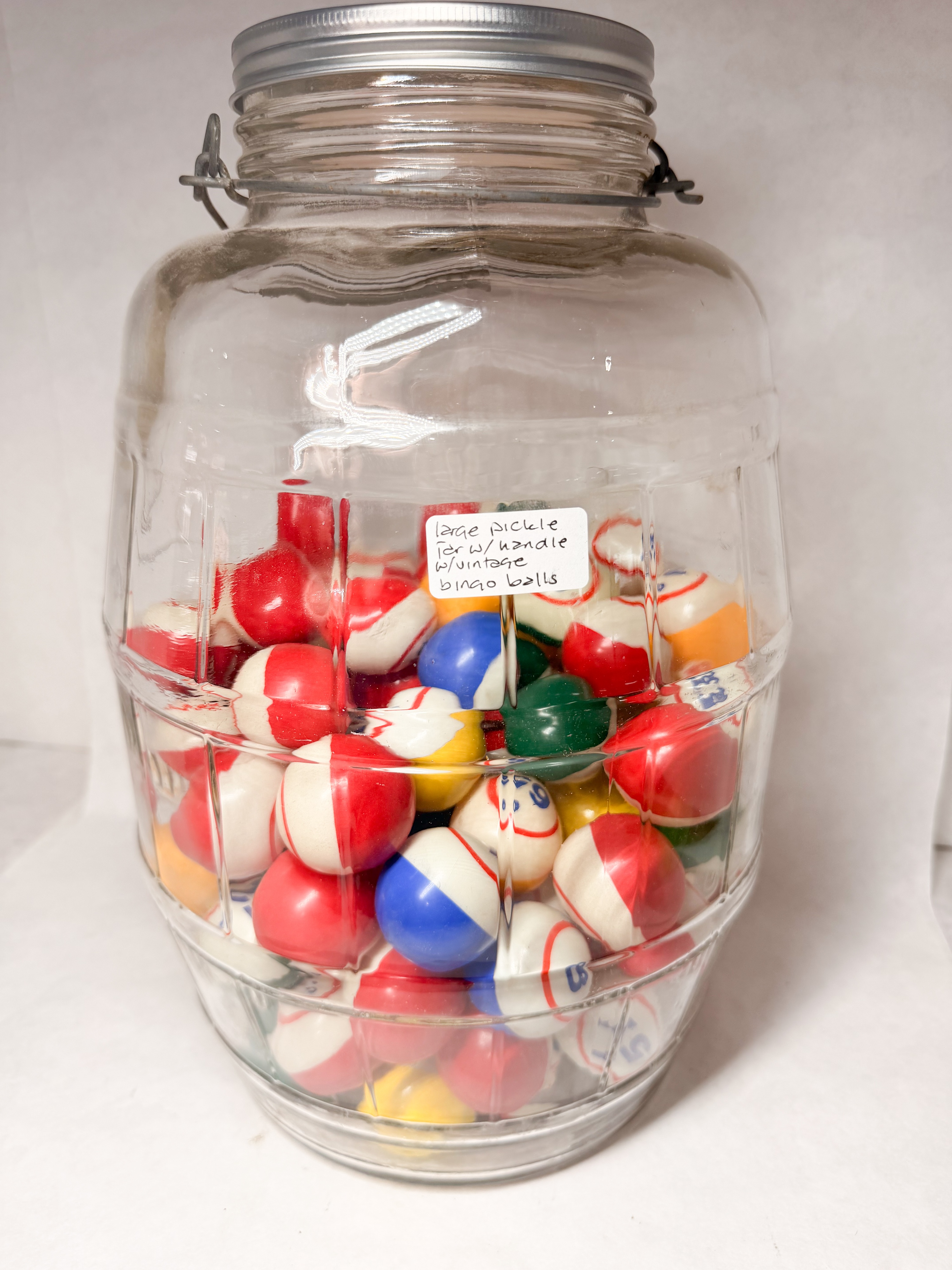 GLASS PICKLE JAR WITH BINGO BALLS