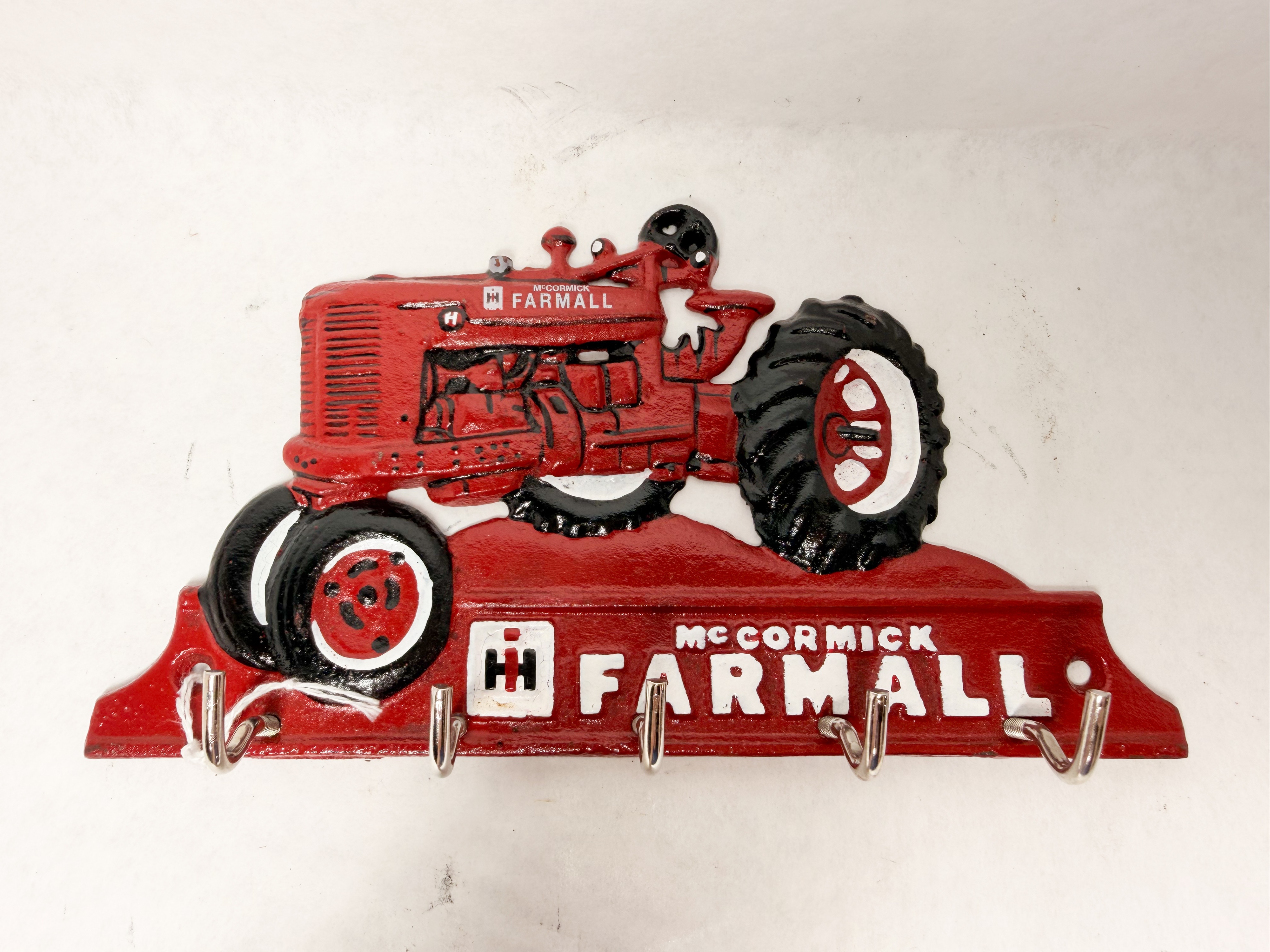 MCCORMICK FARMALL CAST IRON KEY RACK