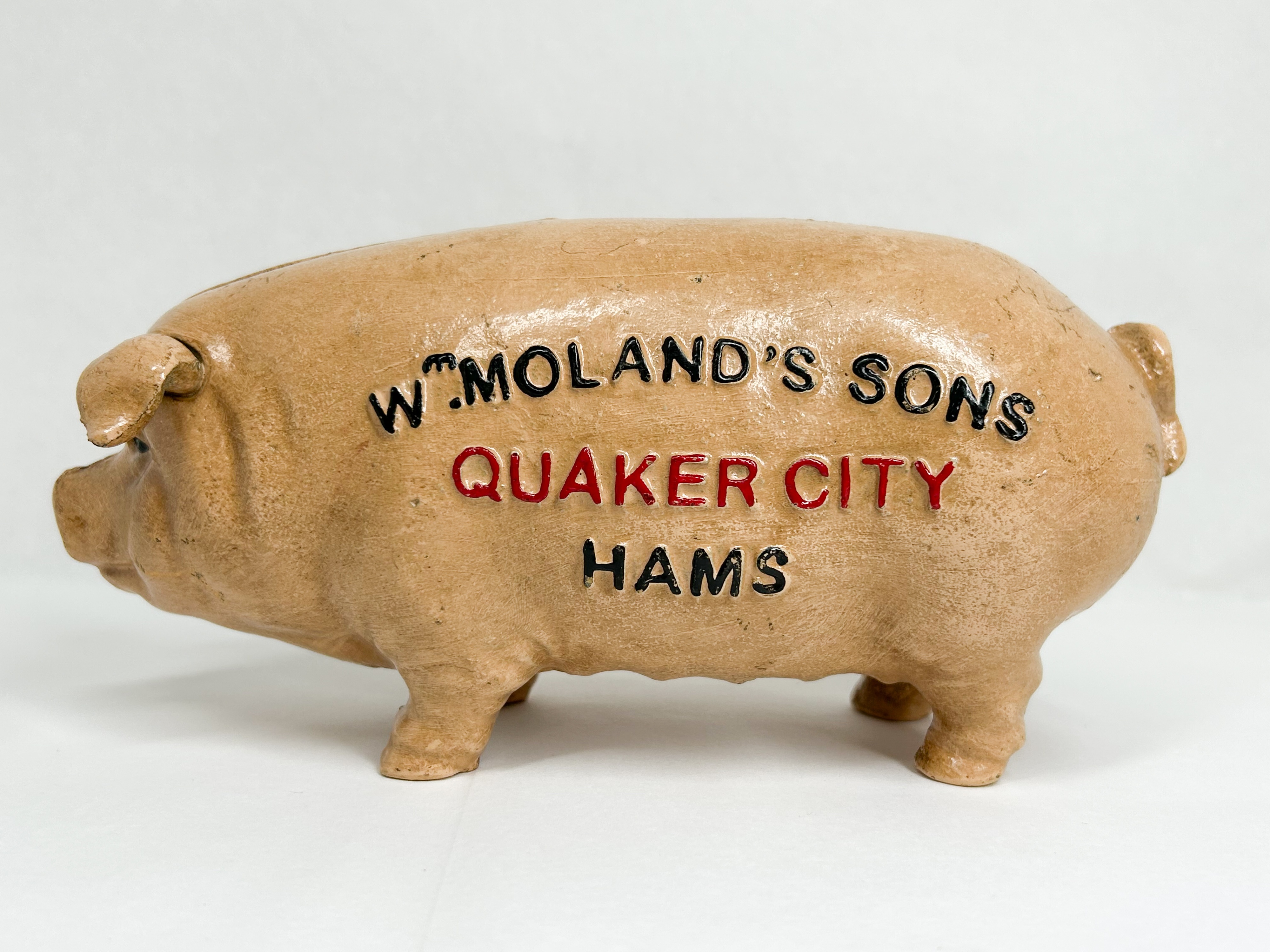 WM. MOLAND’S SONS CAST IRON PIG BANK