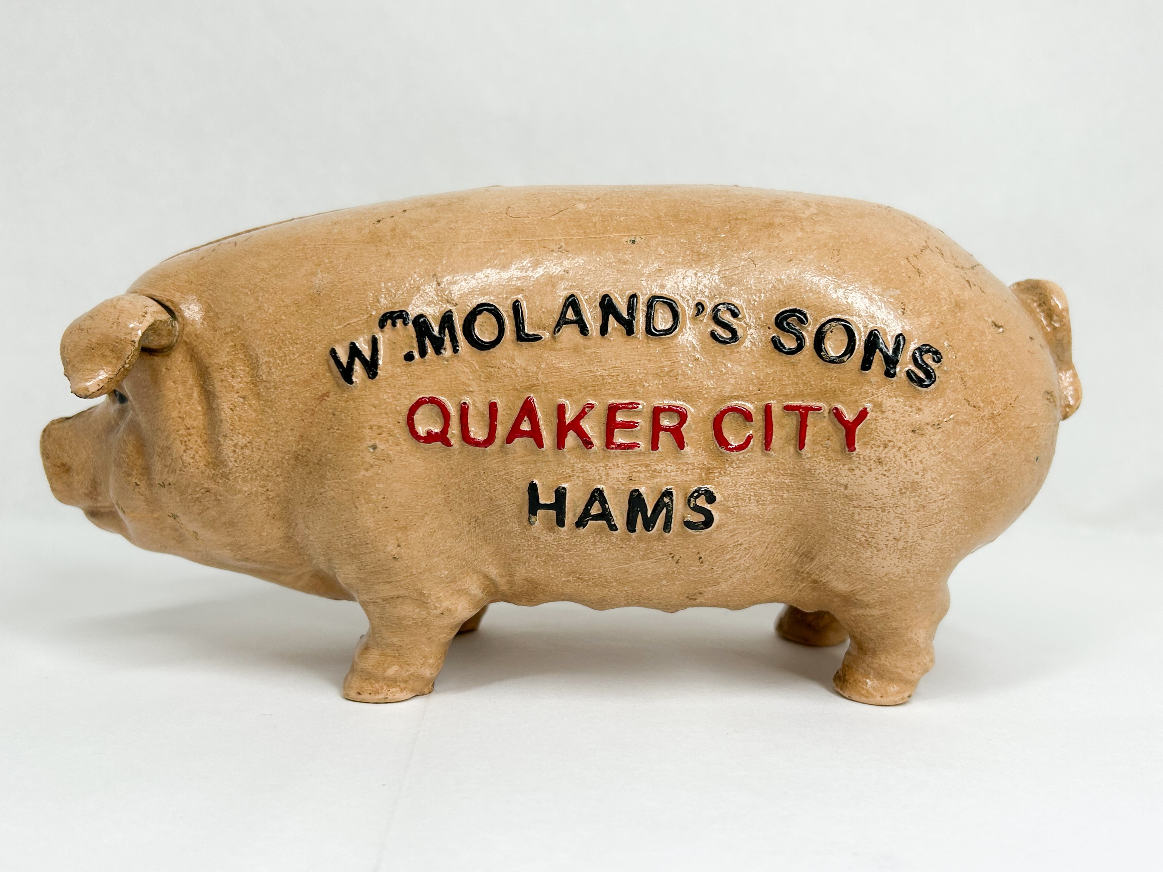 WM. MOLAND’S SONS CAST IRON PIG BANK