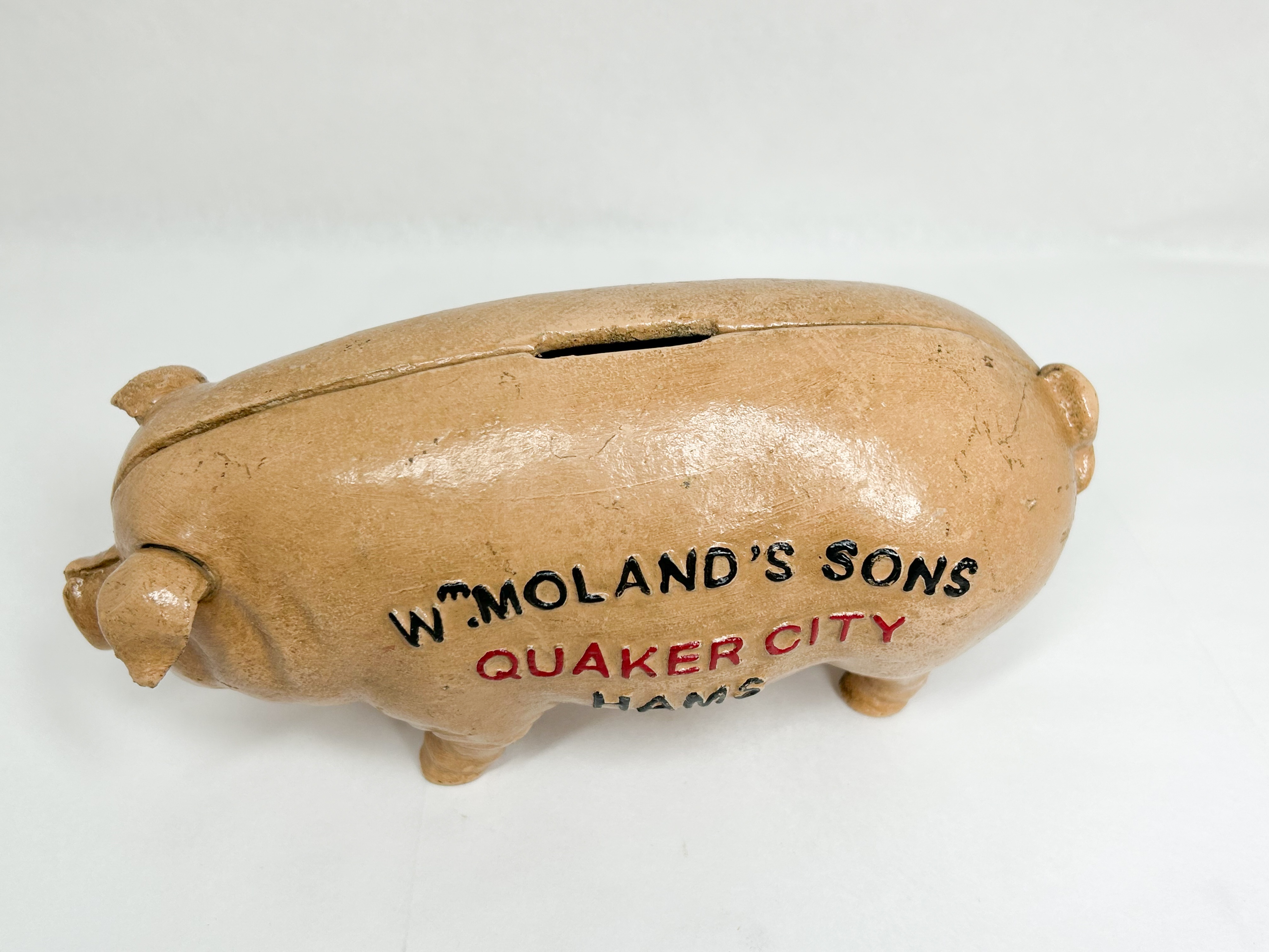 WM. MOLAND’S SONS CAST IRON PIG BANK