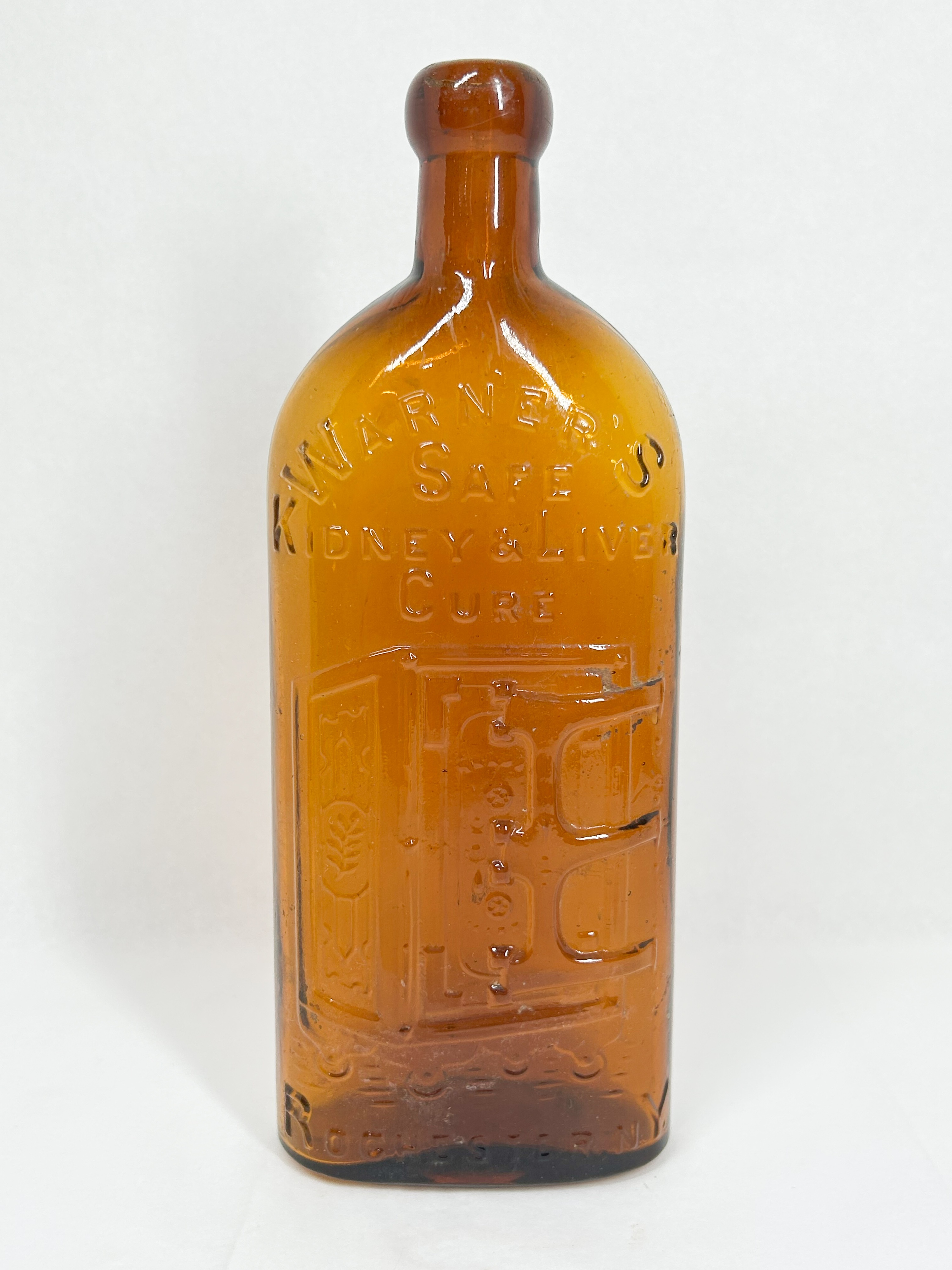 WARNER'S AMBER GLASS MEDICINE BOTTLE