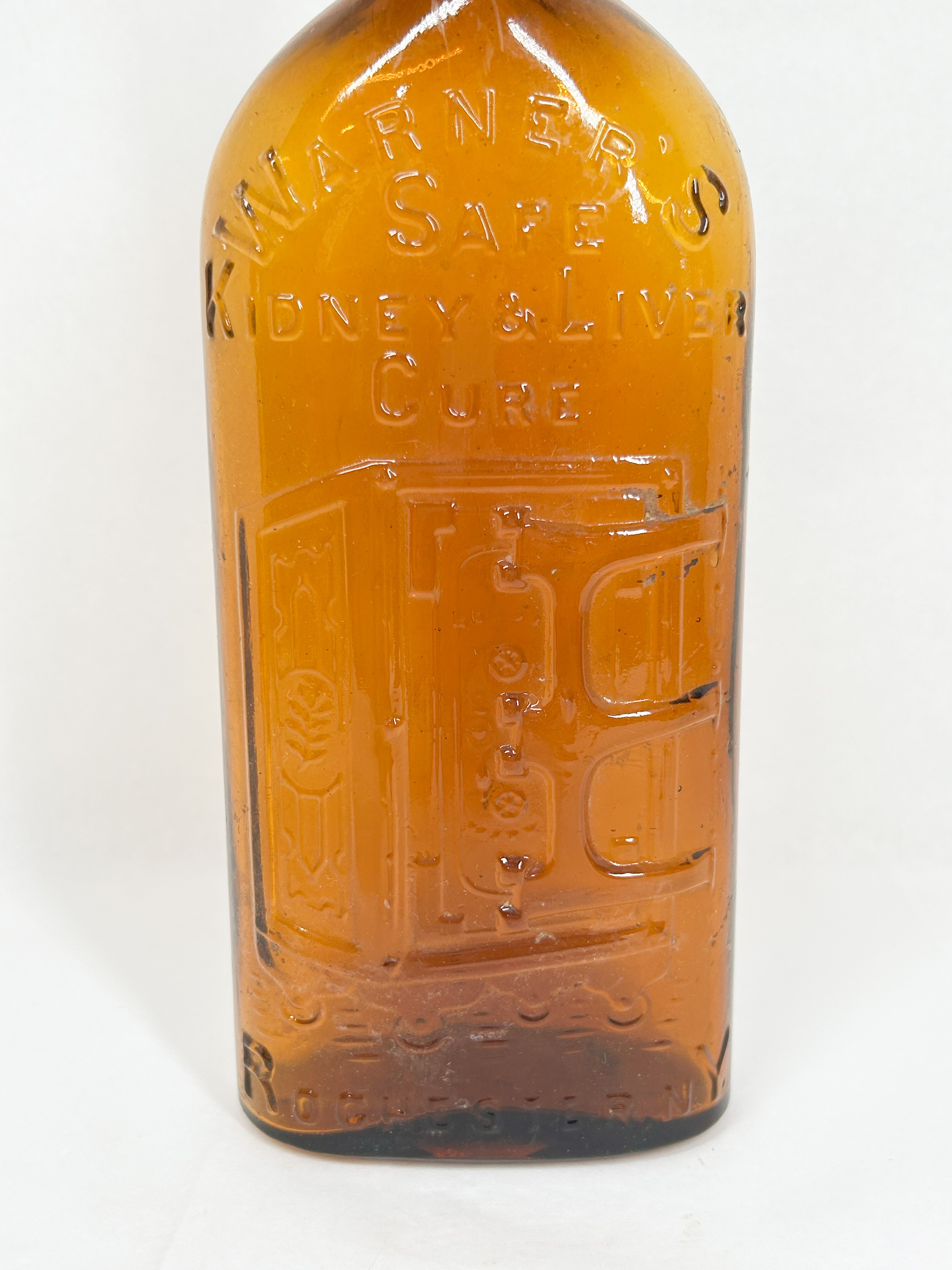 WARNER'S AMBER GLASS MEDICINE BOTTLE