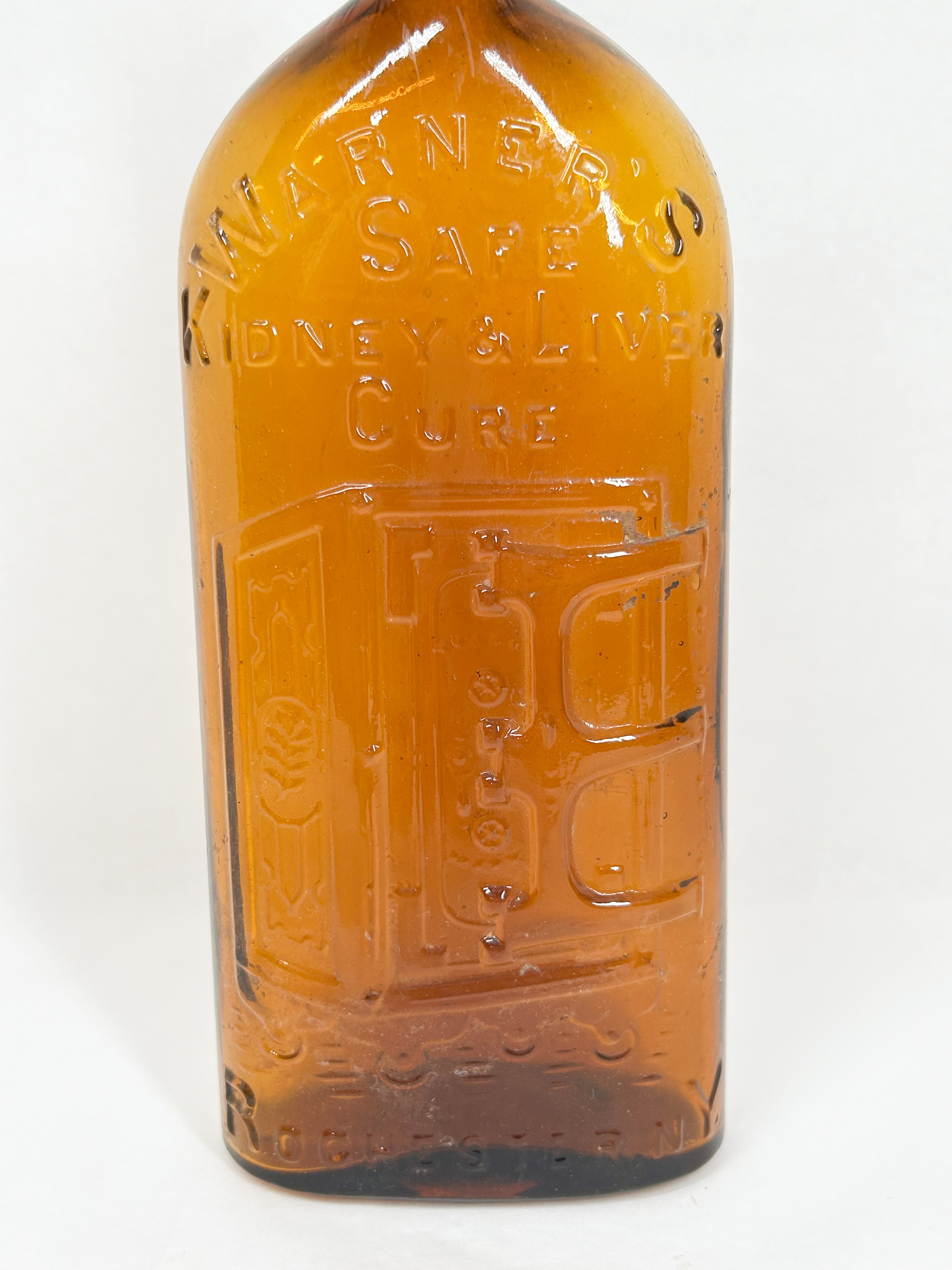 WARNER'S AMBER GLASS MEDICINE BOTTLE