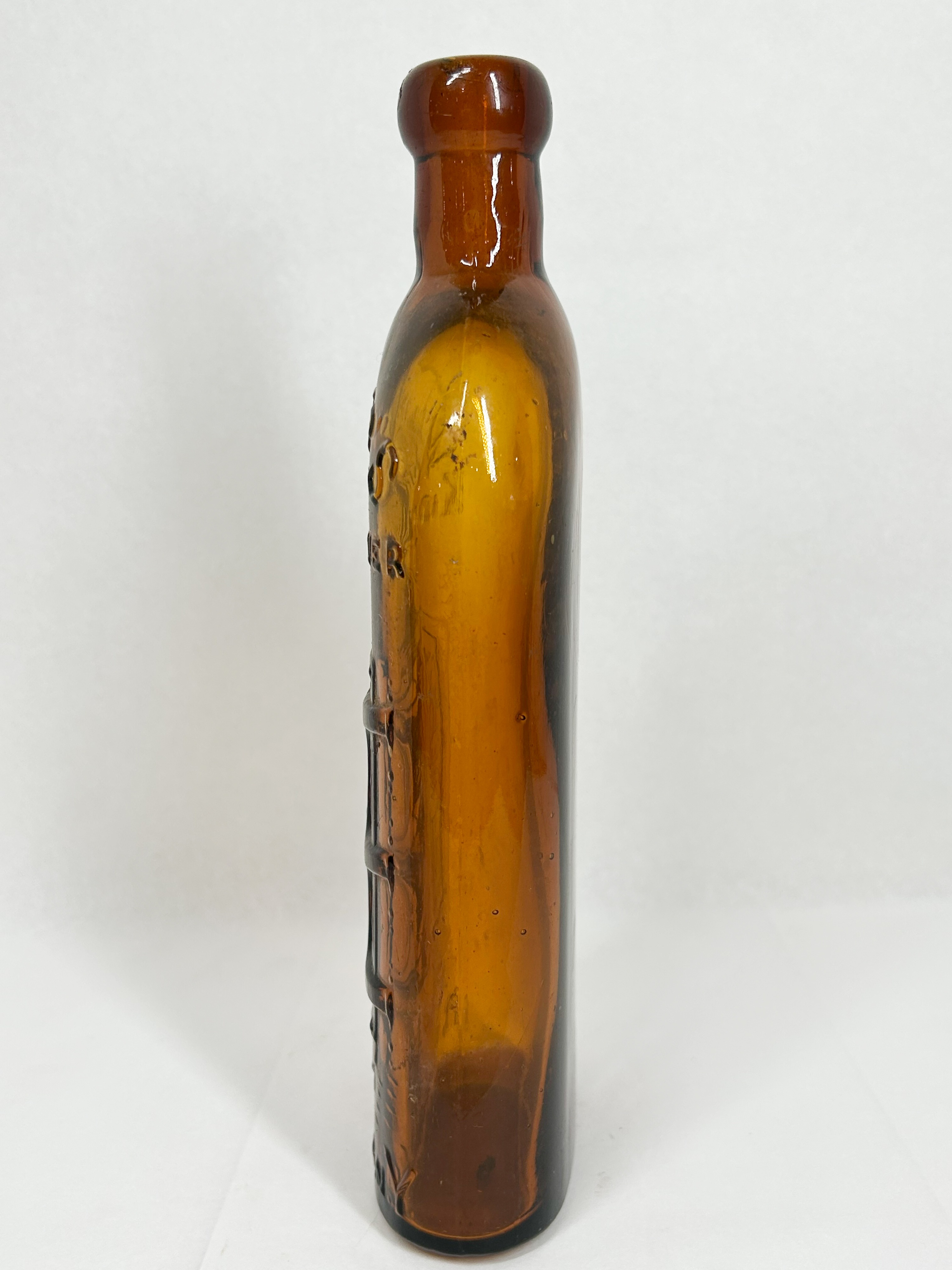 WARNER'S AMBER GLASS MEDICINE BOTTLE