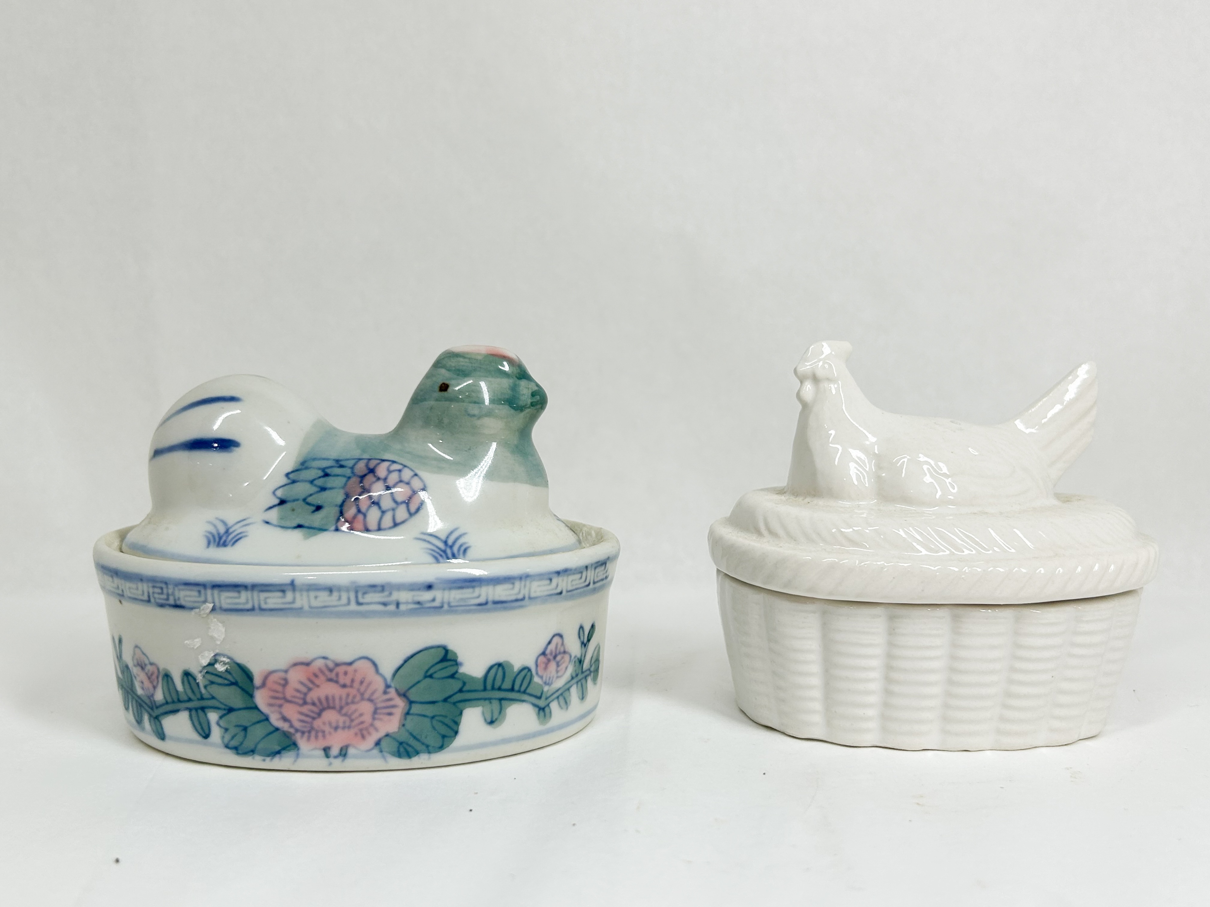 TWO CERAMIC HEN ON NEST TRINKET BOXES