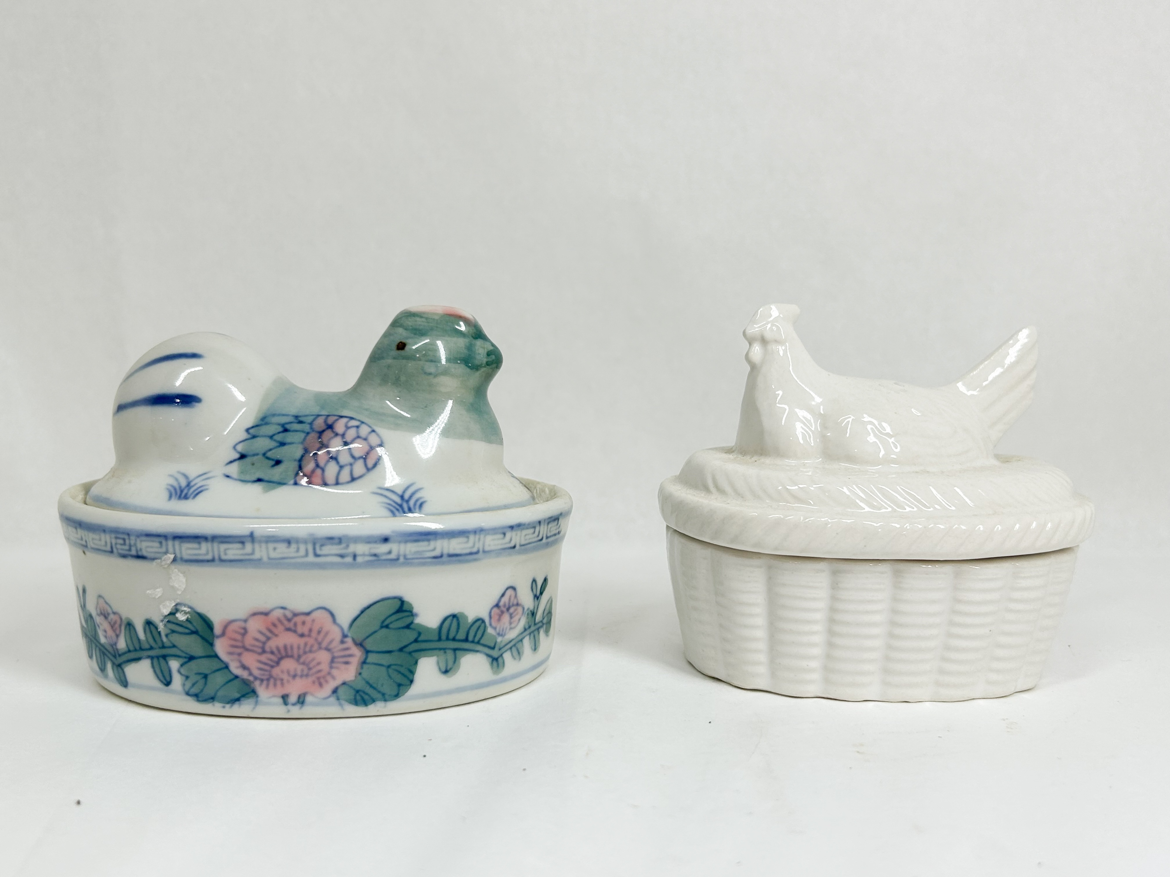 TWO CERAMIC HEN ON NEST TRINKET BOXES