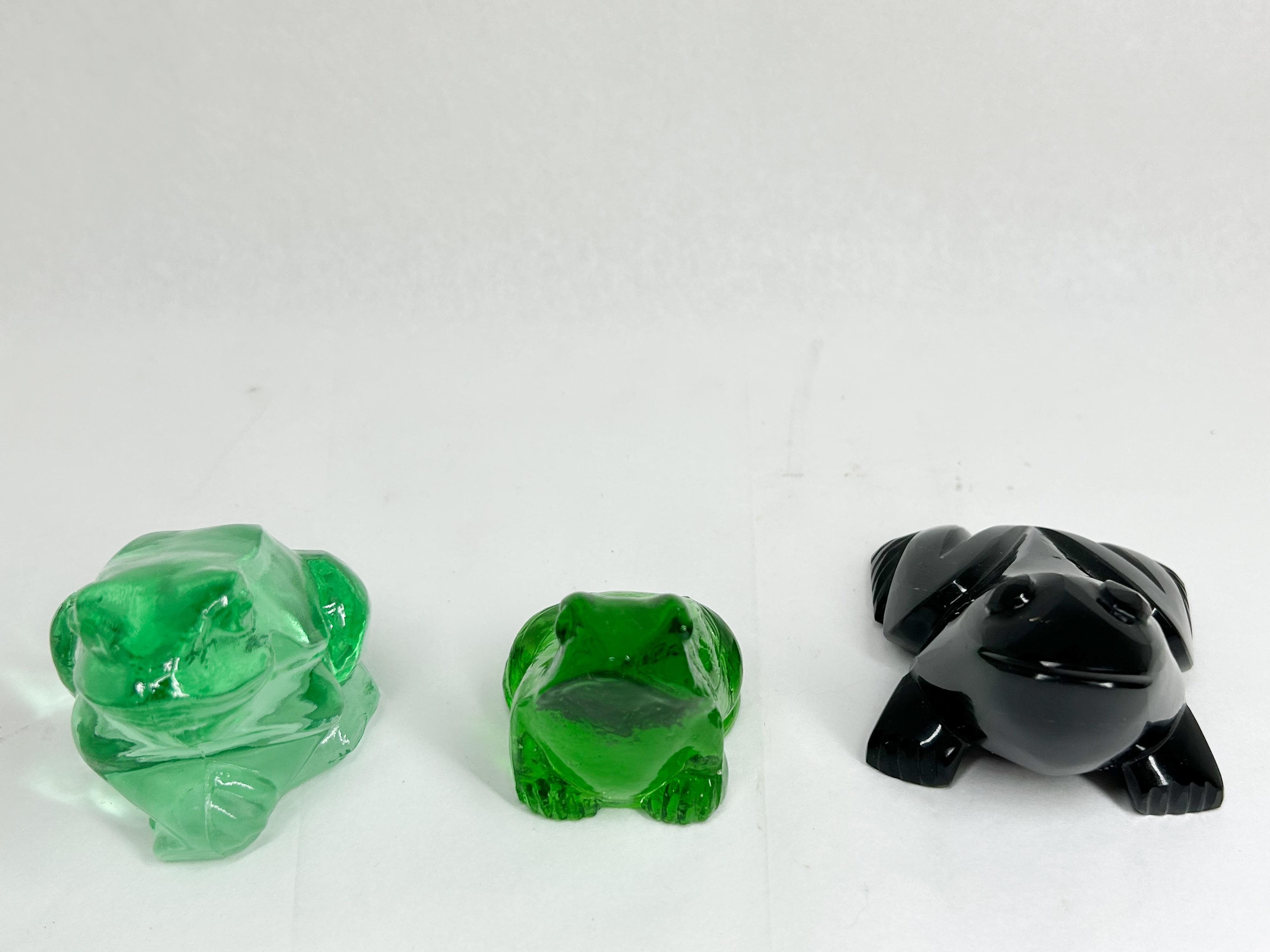 THREE GLASS AND STONE FROG FIGURINES