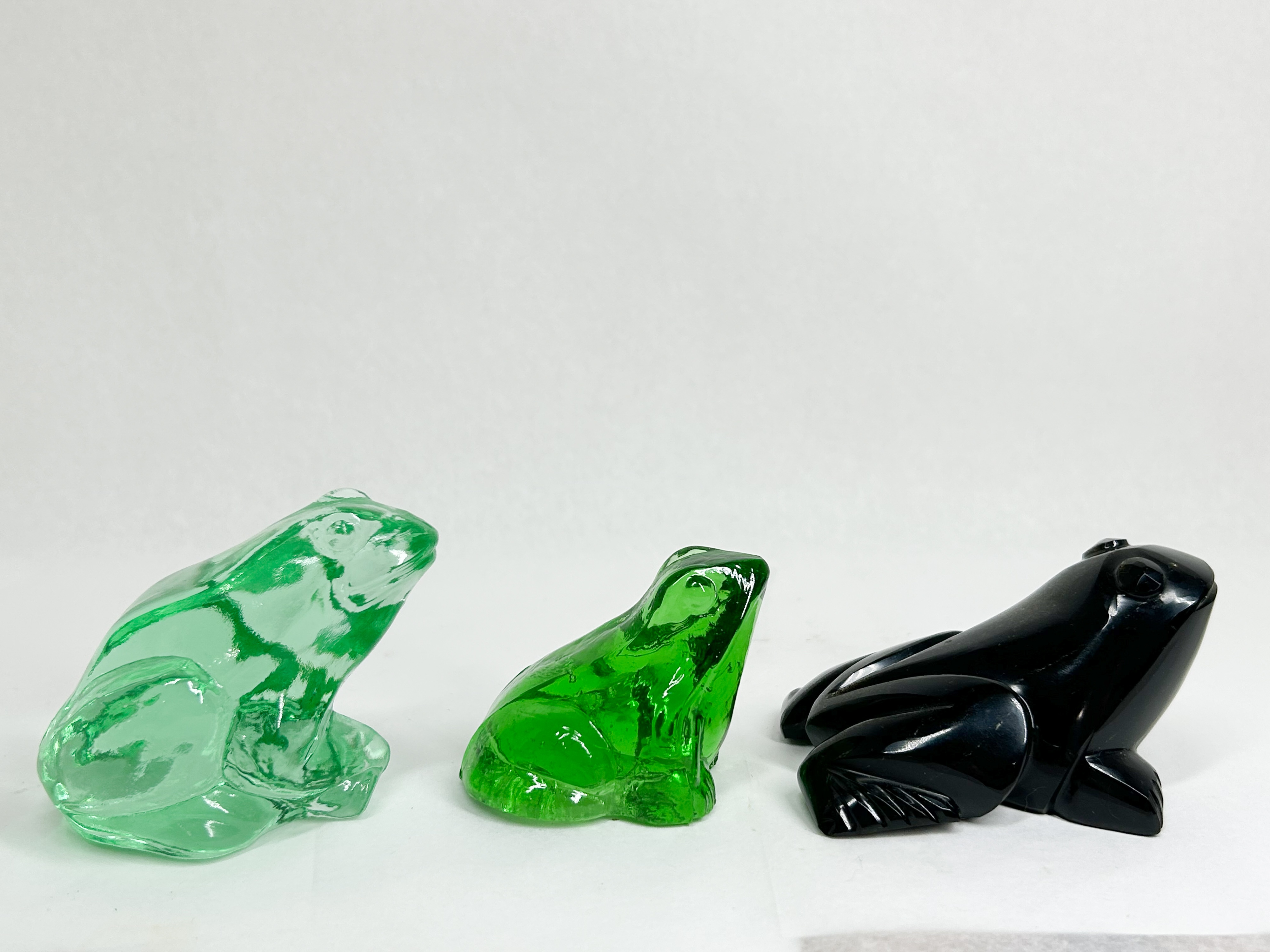 THREE GLASS AND STONE FROG FIGURINES