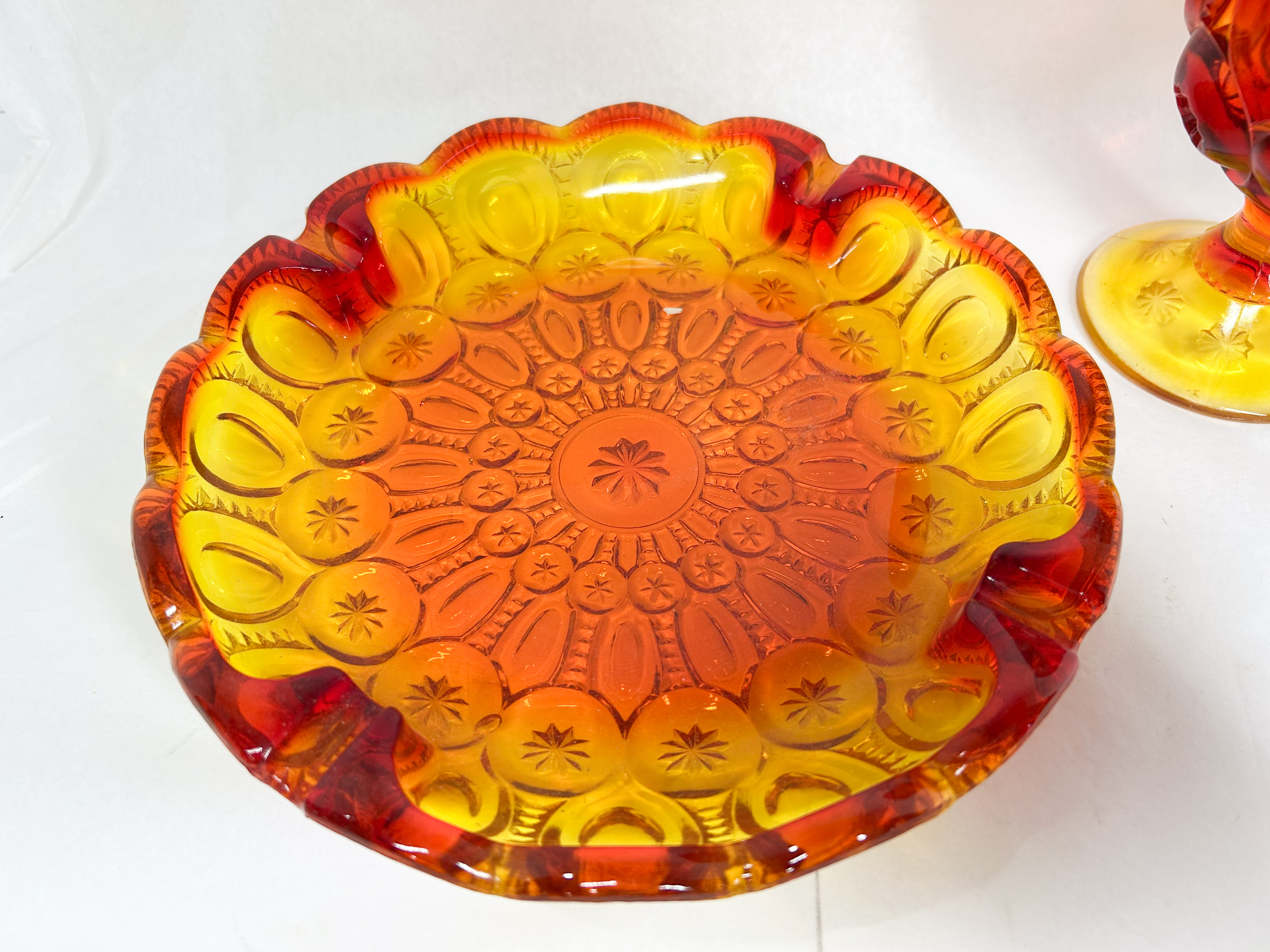 TWO PIECES OF MOON AND STAR AMBERINA GLASS