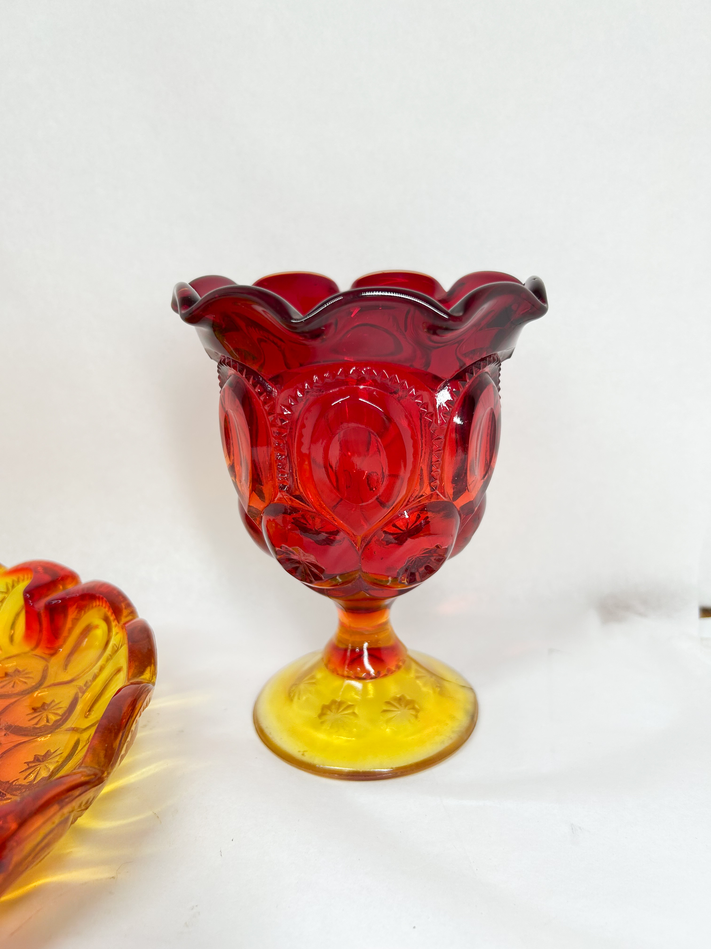 TWO PIECES OF MOON AND STAR AMBERINA GLASS