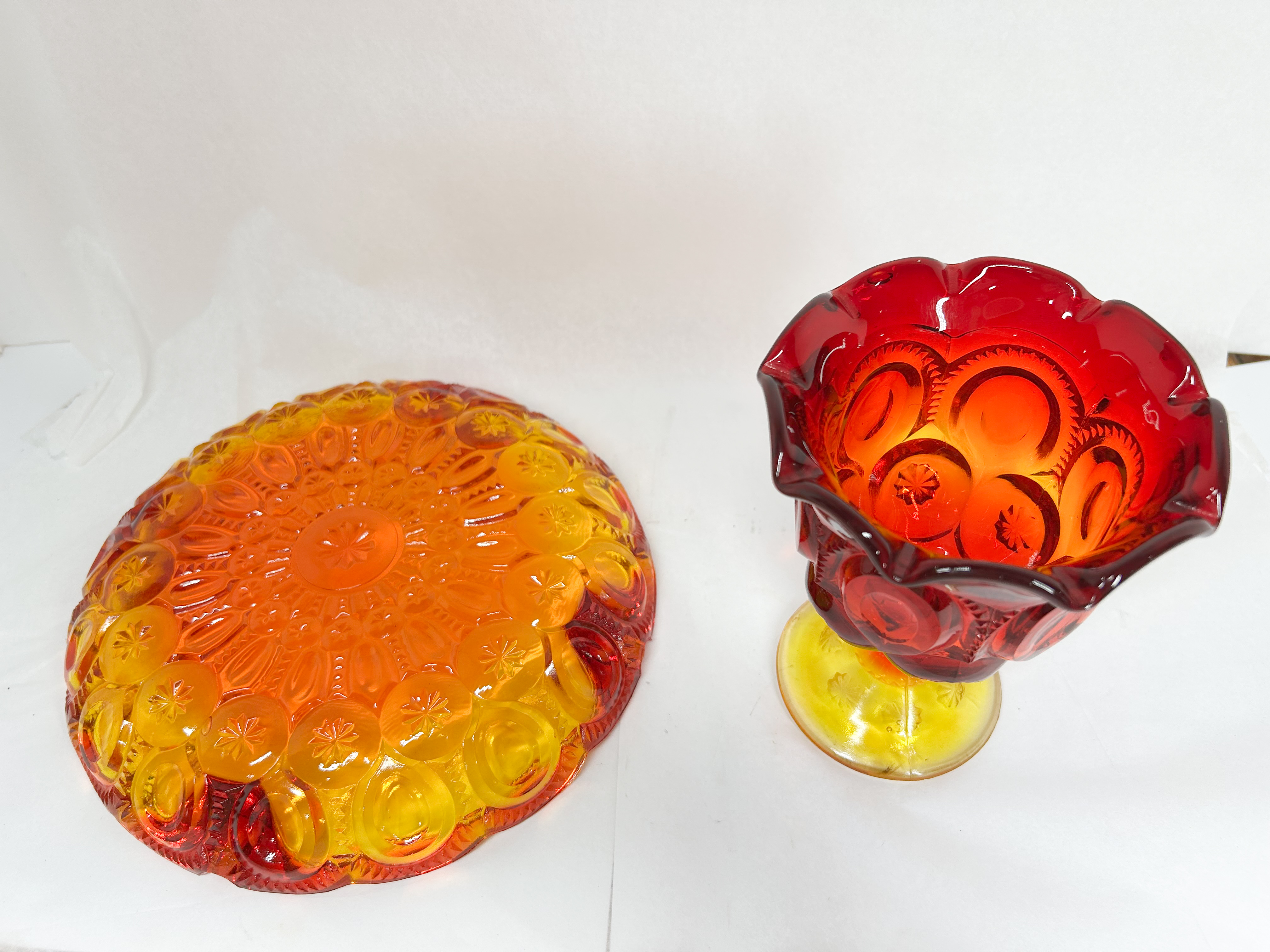 TWO PIECES OF MOON AND STAR AMBERINA GLASS