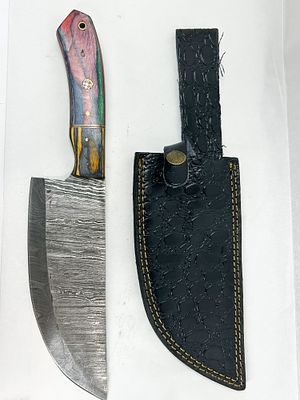 DAMASCUS STEEL CLEAVER WITH LAMINATE HANDLE. Fixed blade cleaver constructed from pattern-welded 