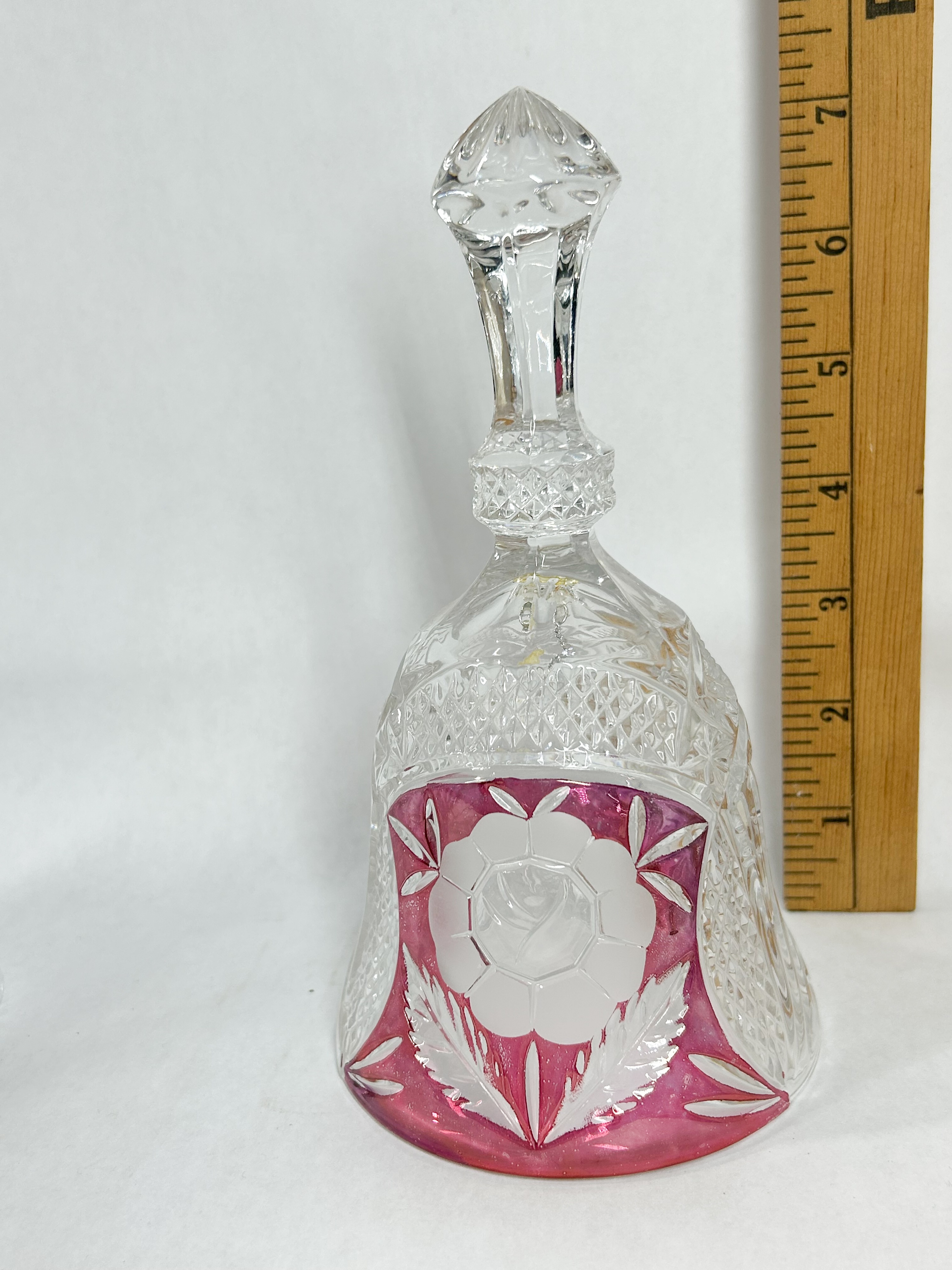 COLLECTION OF FIVE CUT AND ETCHED CRYSTAL HAND BELLS