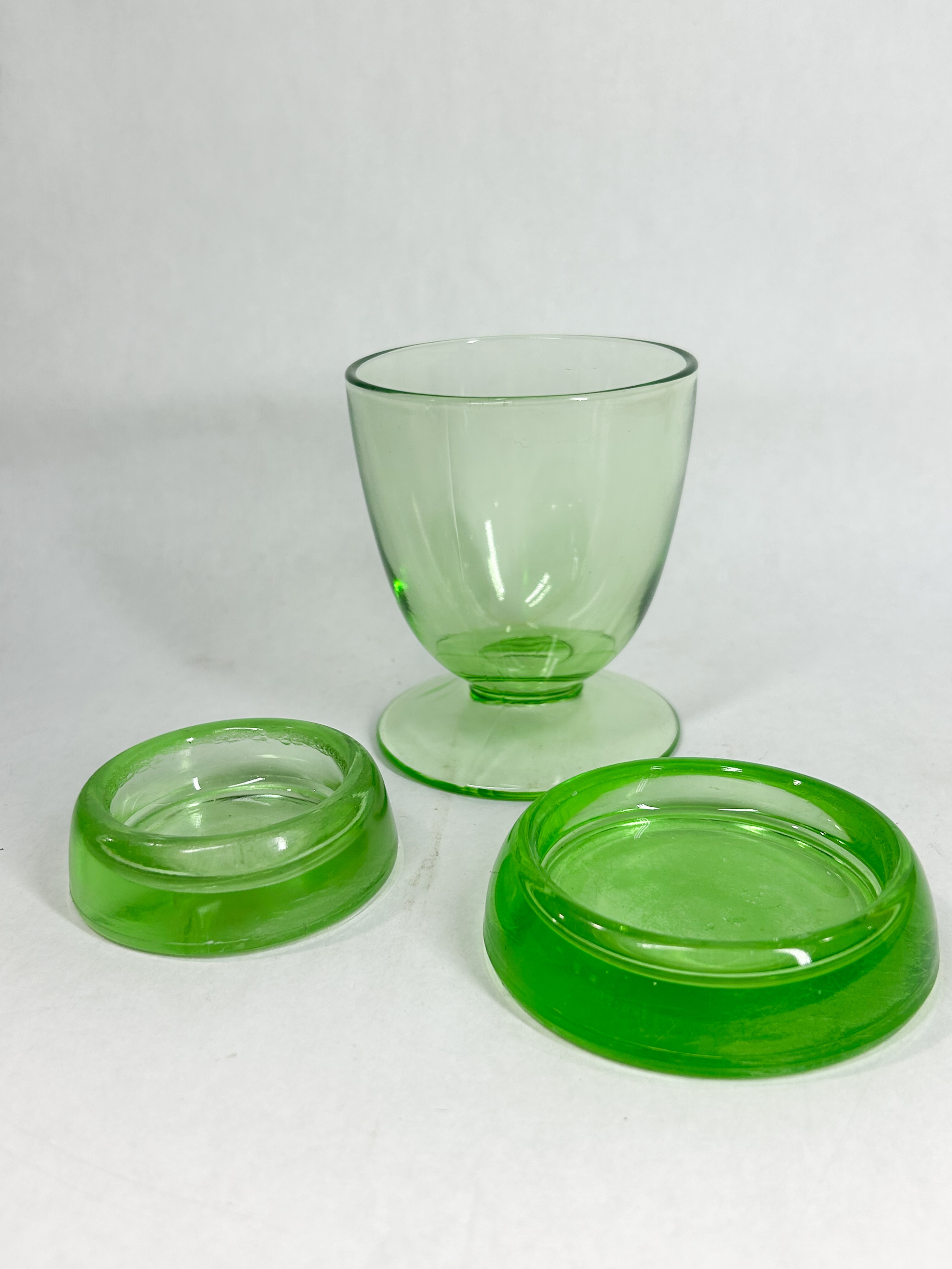 HEISEY URANIUM GLASS CUP AND CASTERS