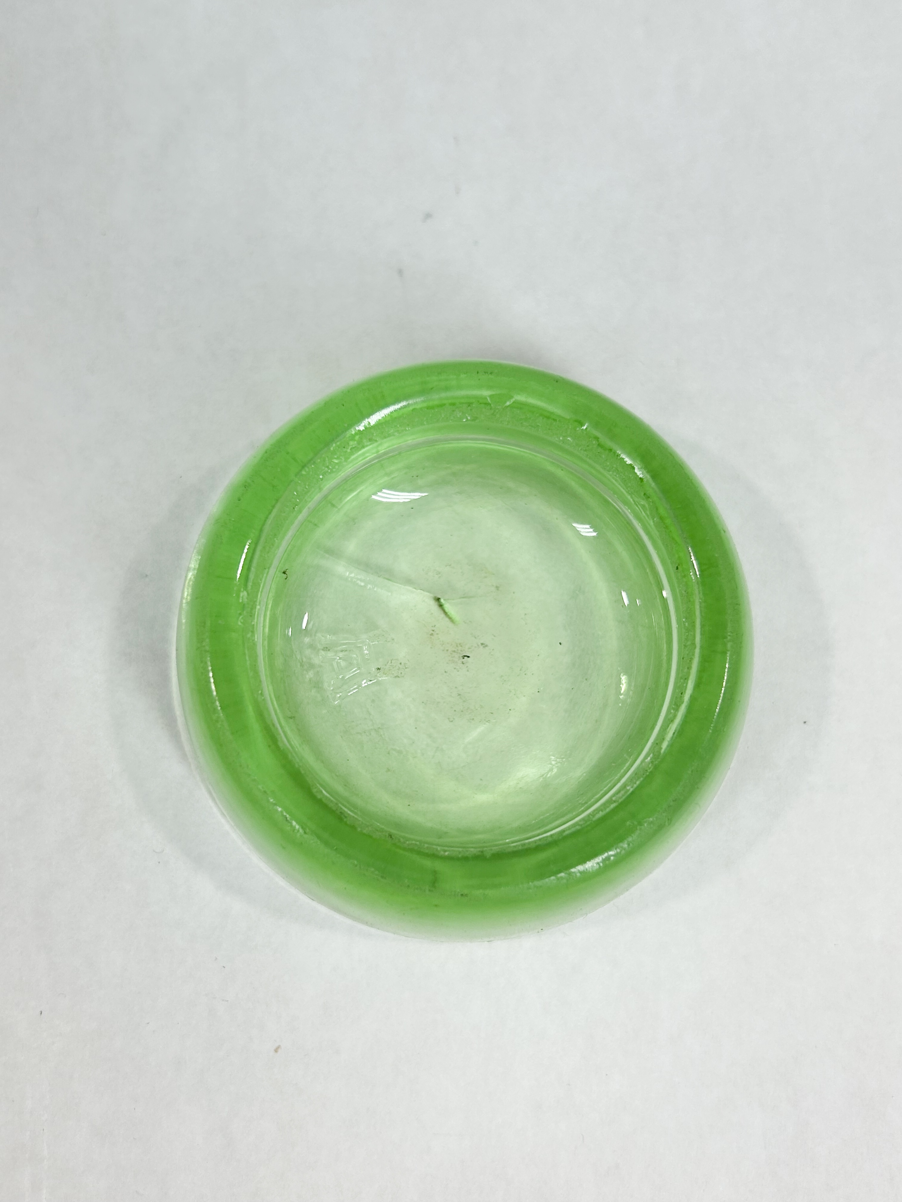 HEISEY URANIUM GLASS CUP AND CASTERS