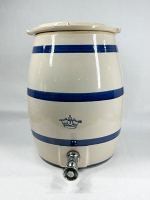 ROBINSON RANSBOTTOM STONEWARE WATER COOLER. Two-gallon stoneware water cooler featuring a barrel 
