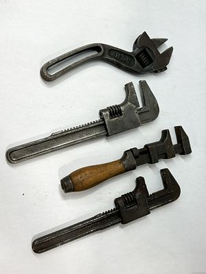 BEMIS & CALL ADJUSTABLE WRENCH COLLECTION AND BOOK. A collection of four antique adjustable 