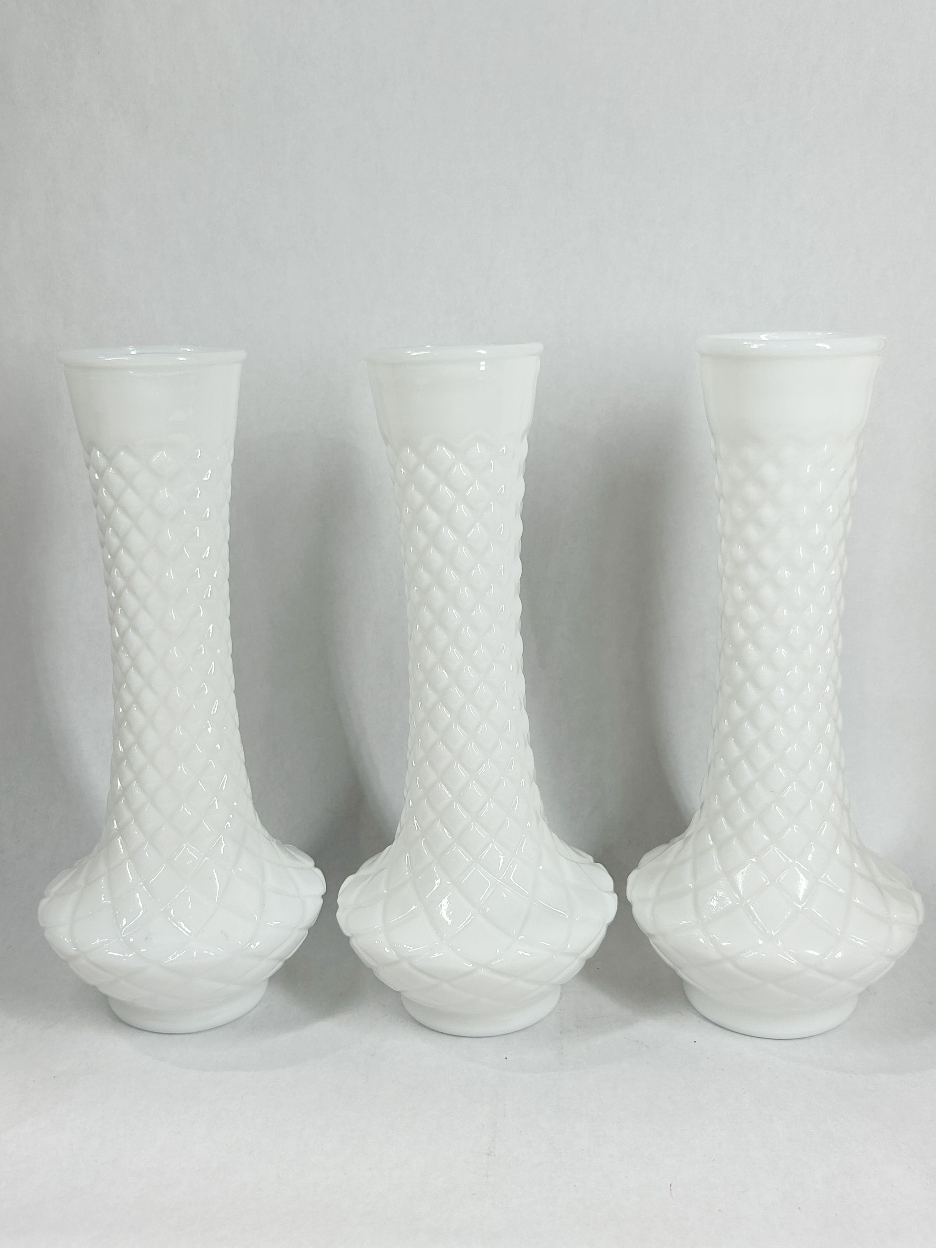 TRIO OF MILK GLASS BUD VASES