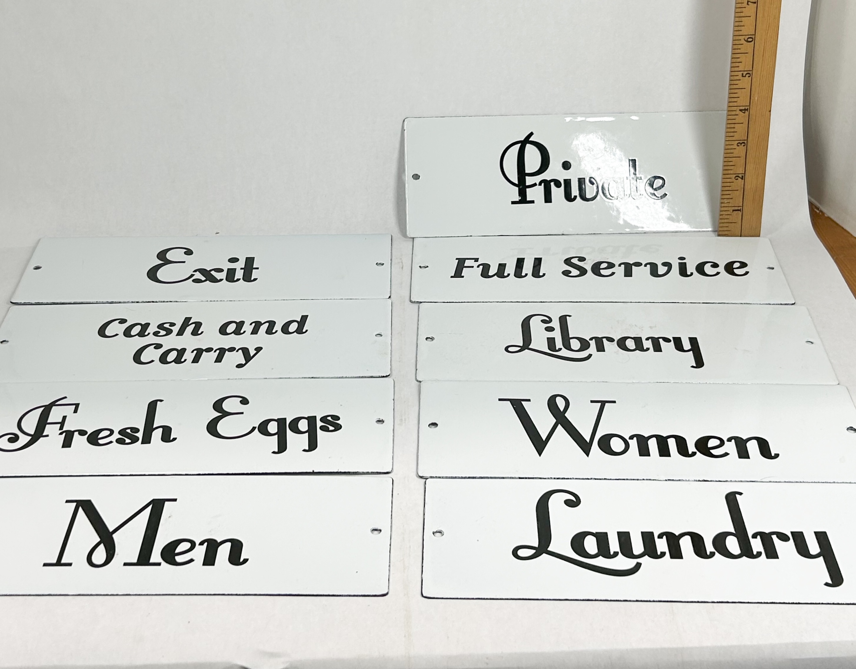 NINE ENAMEL METAL ADVERTISING SIGNS