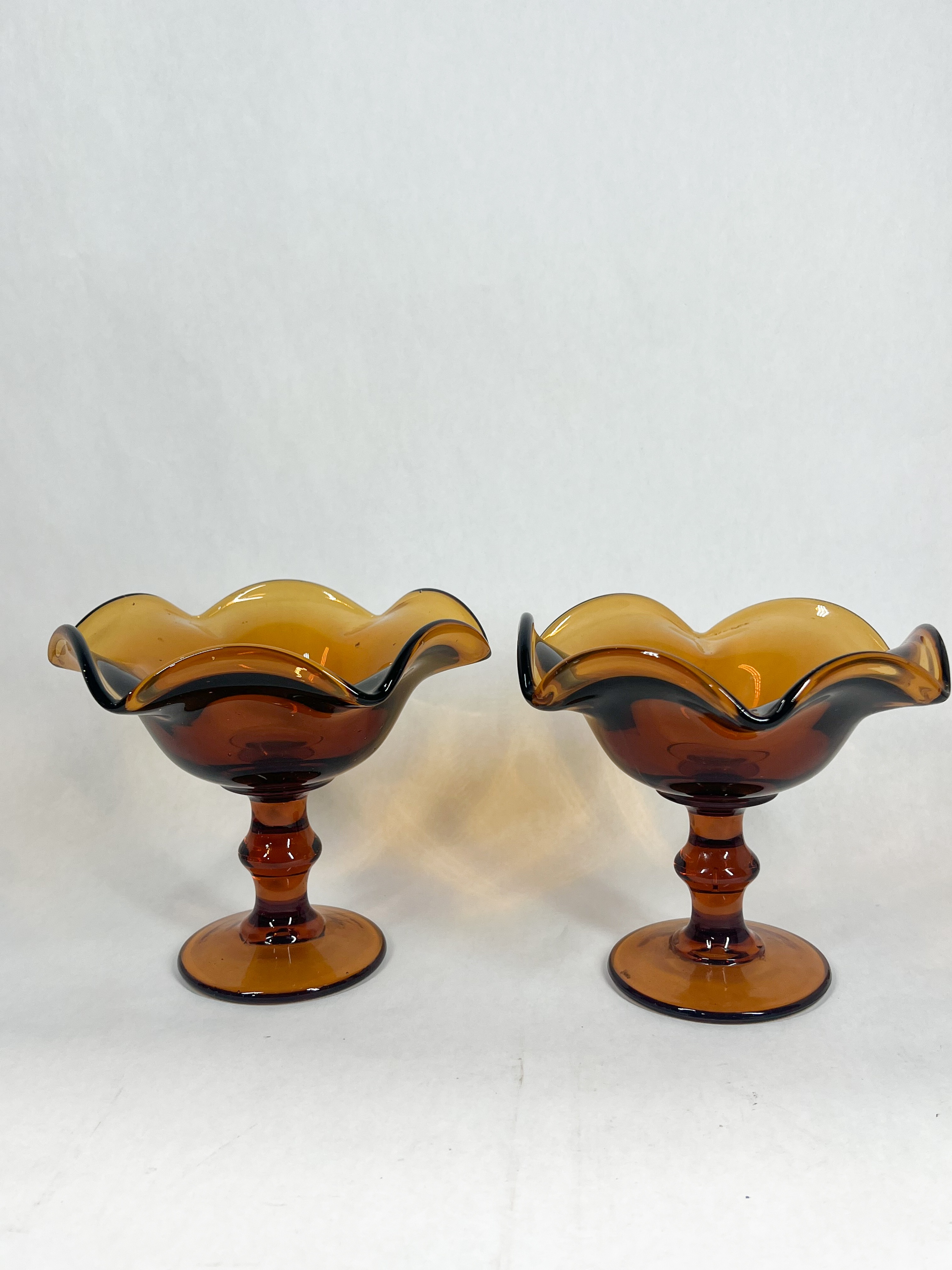 PAIR OF AMBER ART GLASS COMPOTES