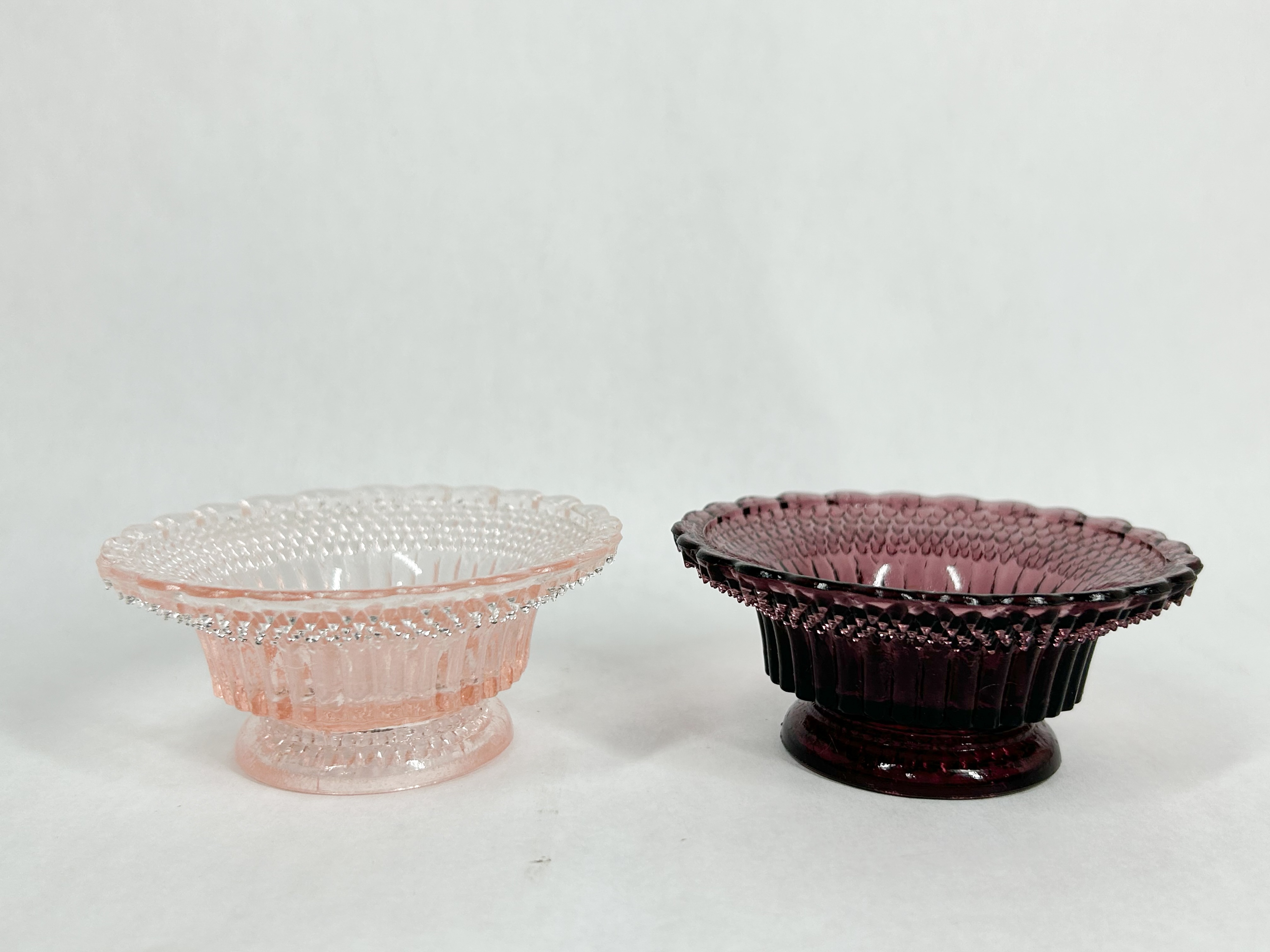 TWO DEGENHART GLASS HOBNAIL SALT CELLARS