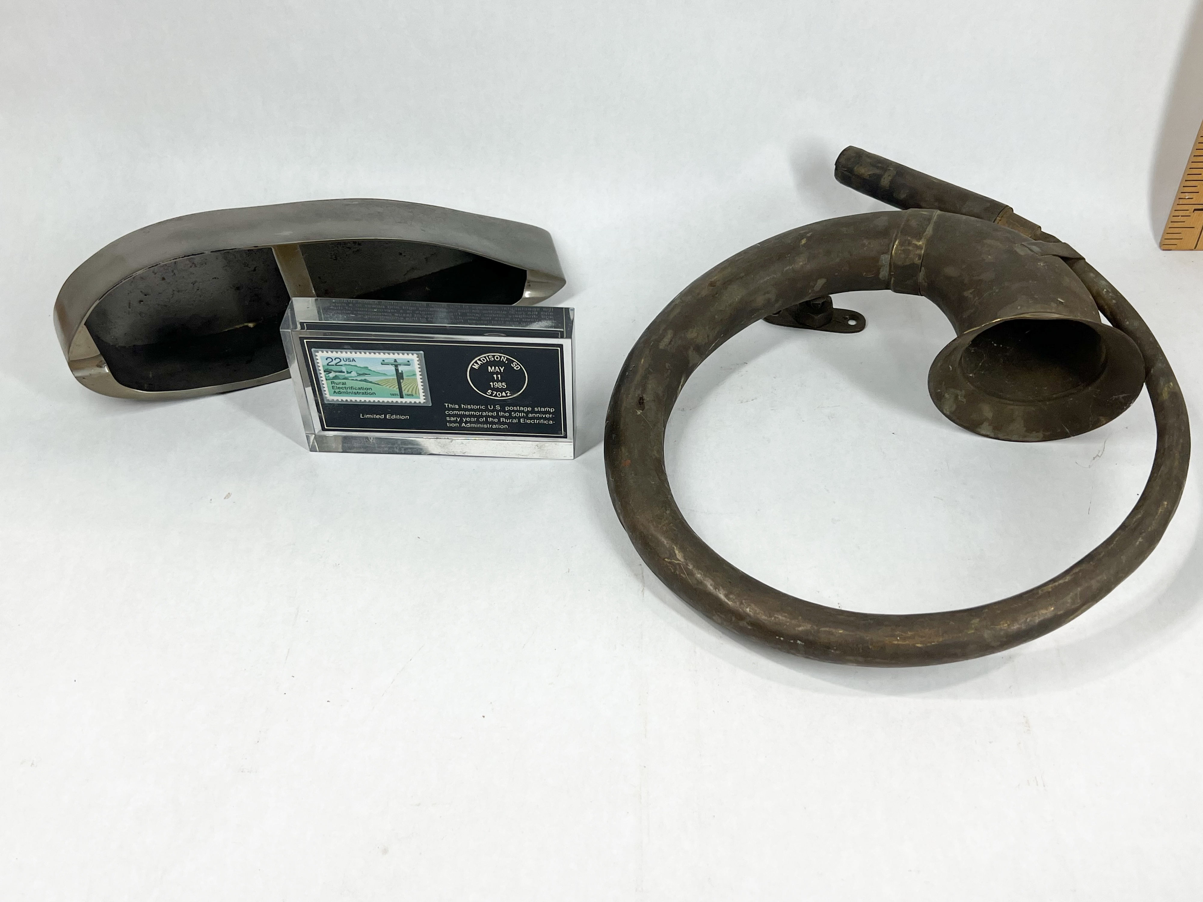 BRASS AUTOMOBILE HORN, STEEL ASHTRAY, AND REA STAMP PAPERWEIGHT