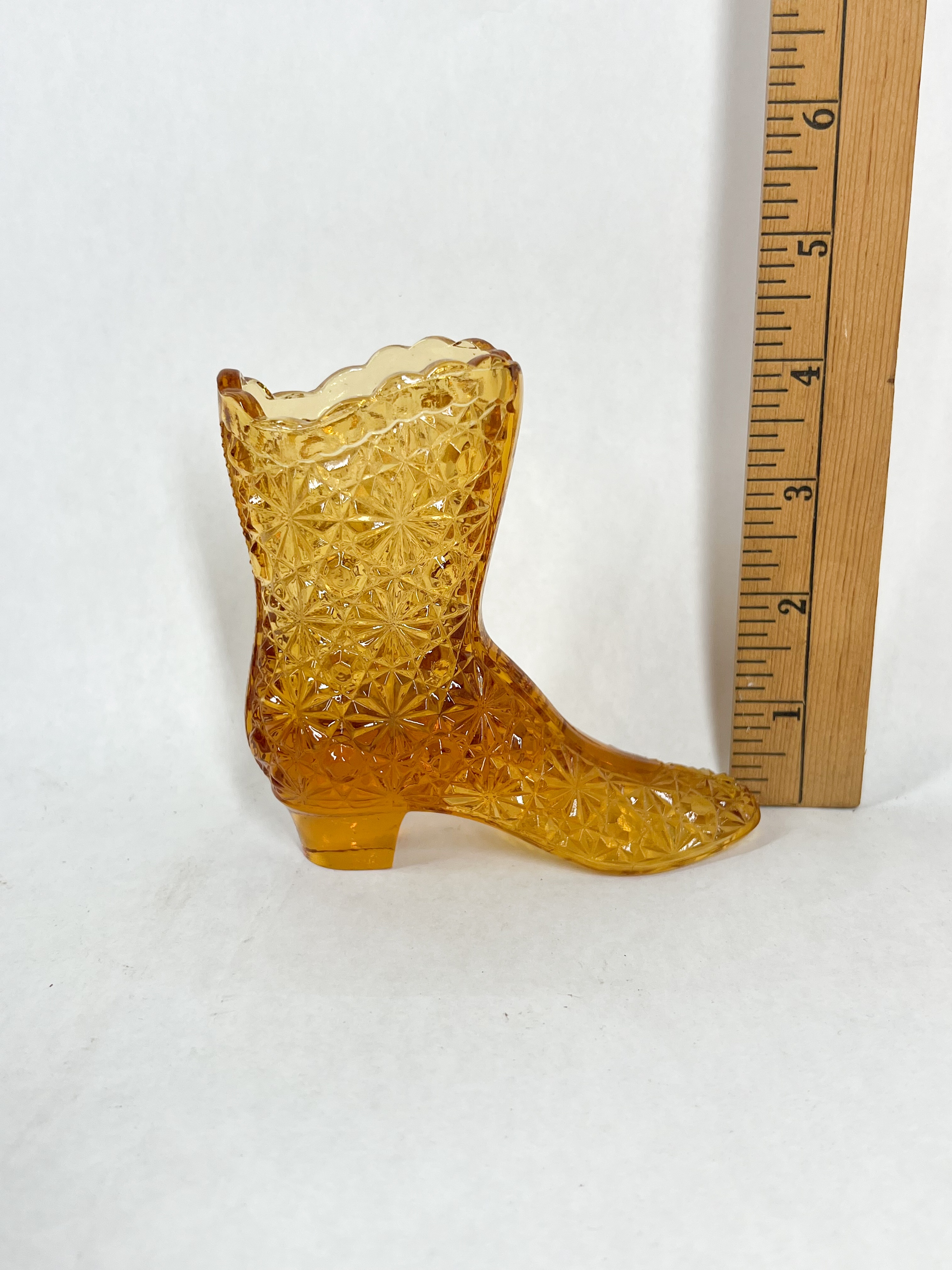 TWO AMBER GLASS SHOES
