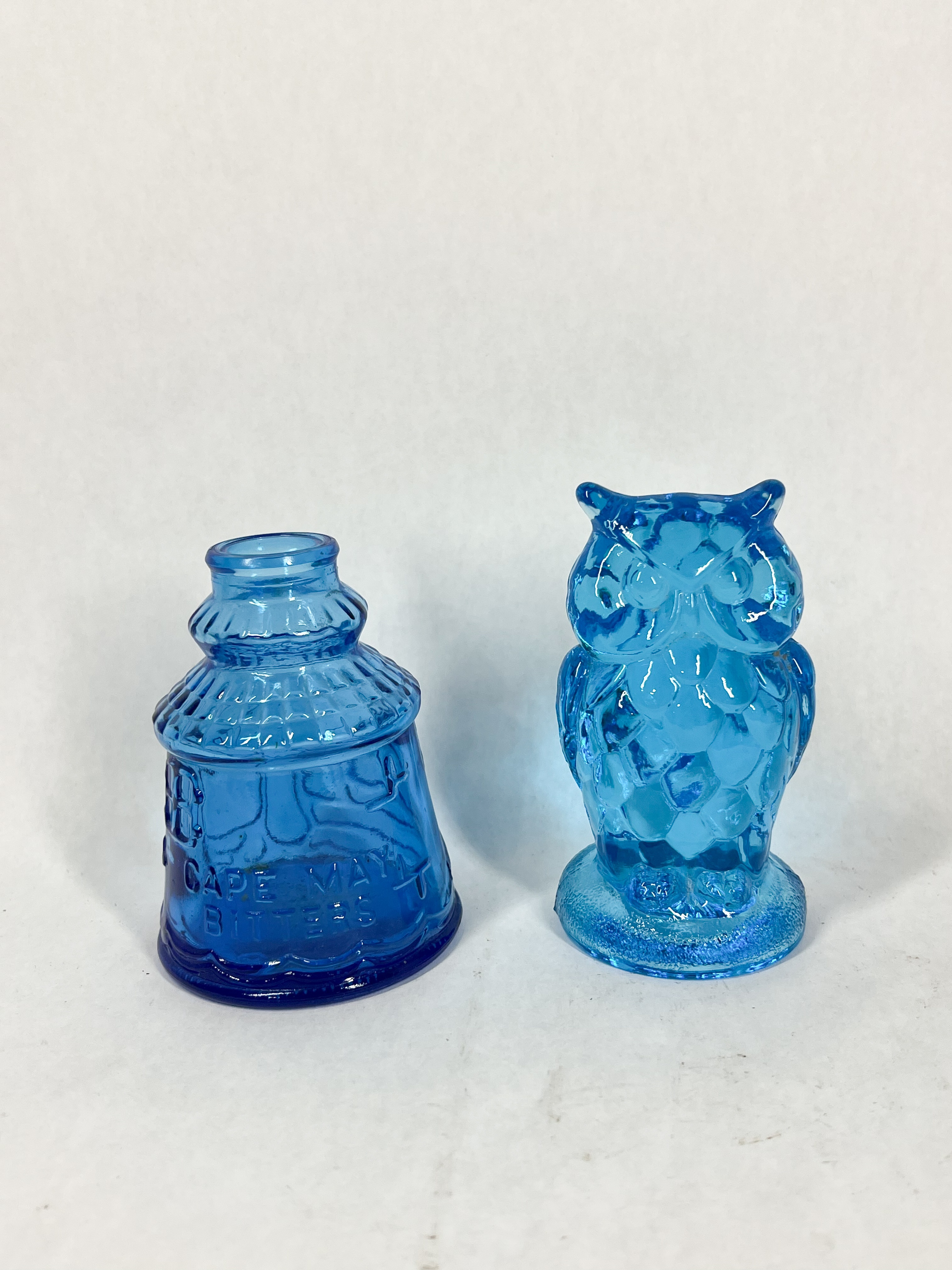 TWO BLUE GLASS OWL AND BOTTLE
