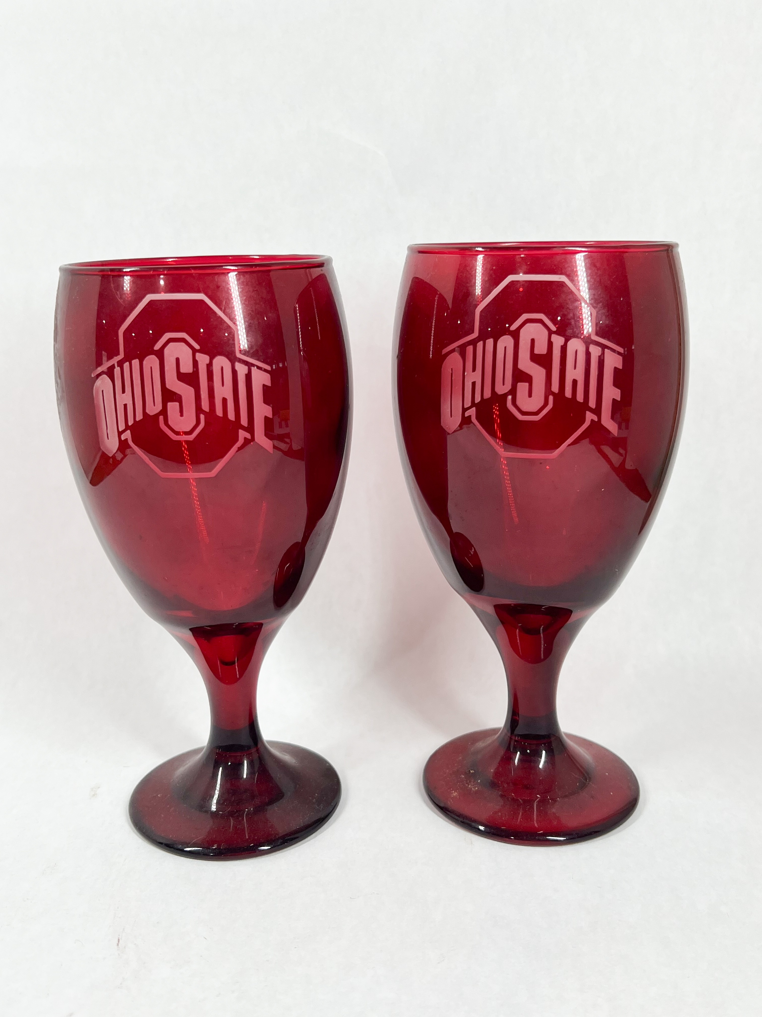 A PAIR OF OHIO STATE RED GLASS GOBLETS