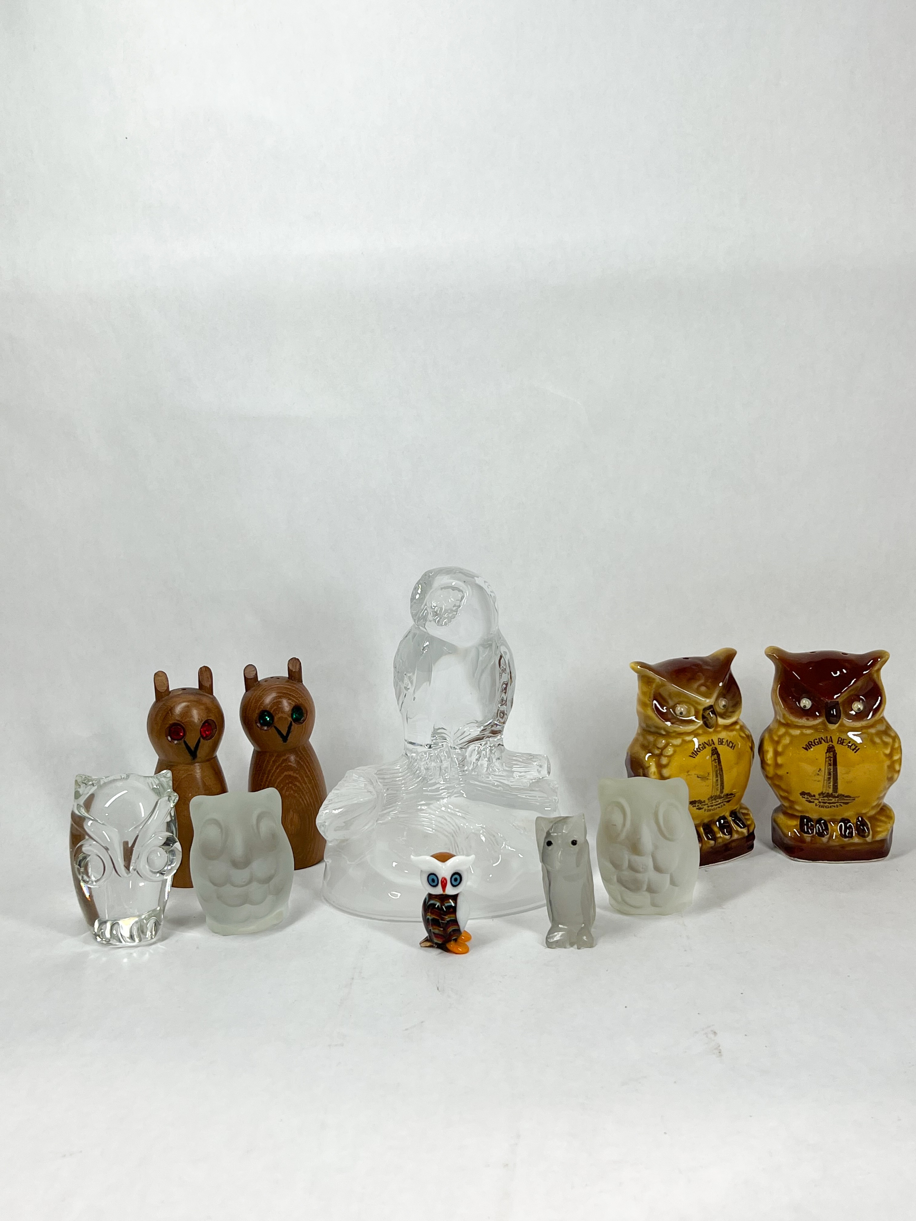 ASSORTED COLLECTION OF GLASS, CERAMIC, AND WOOD OWL FIGURINES