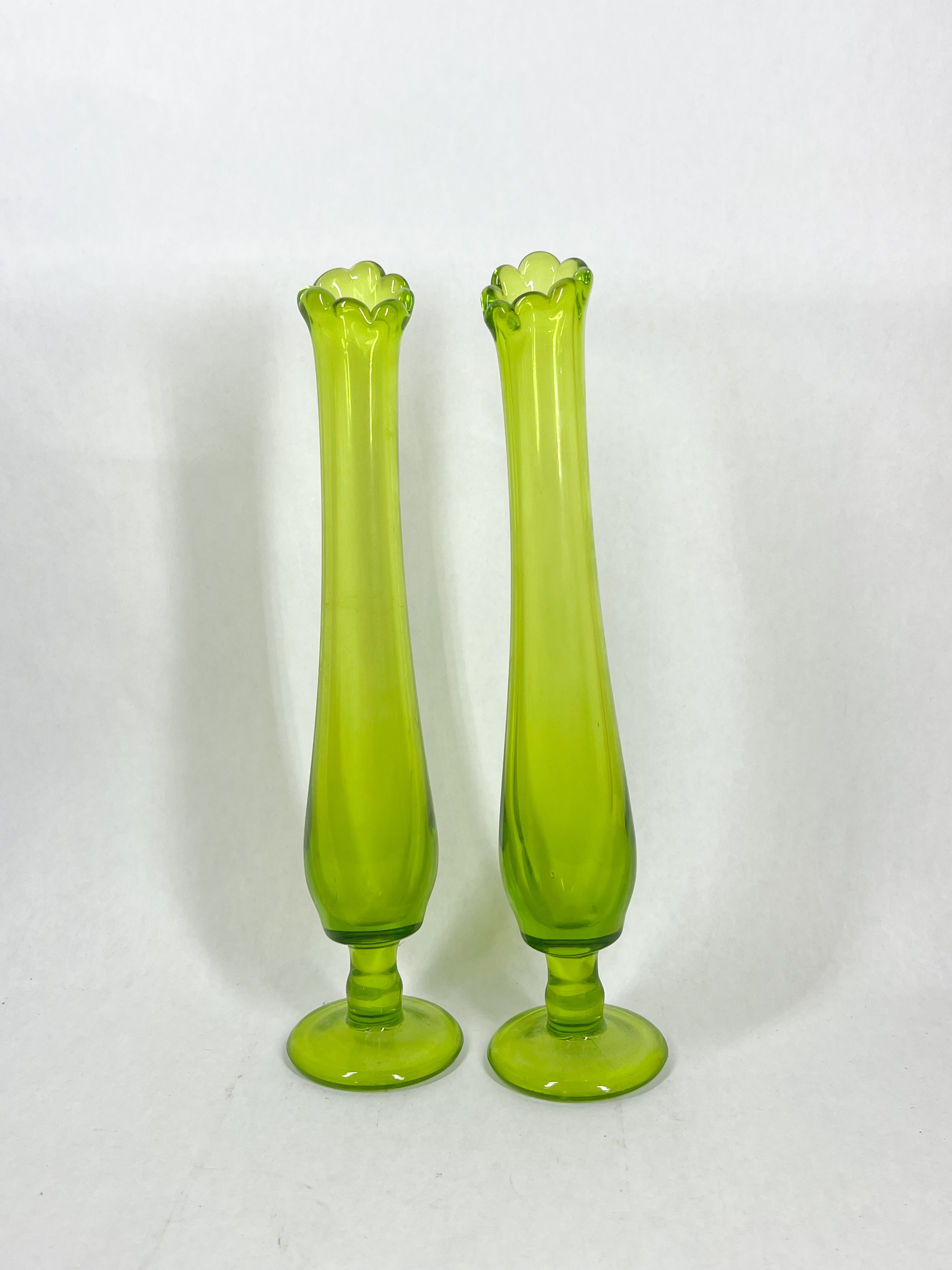 PAIR OF SWUNG GLASS BUD VASES