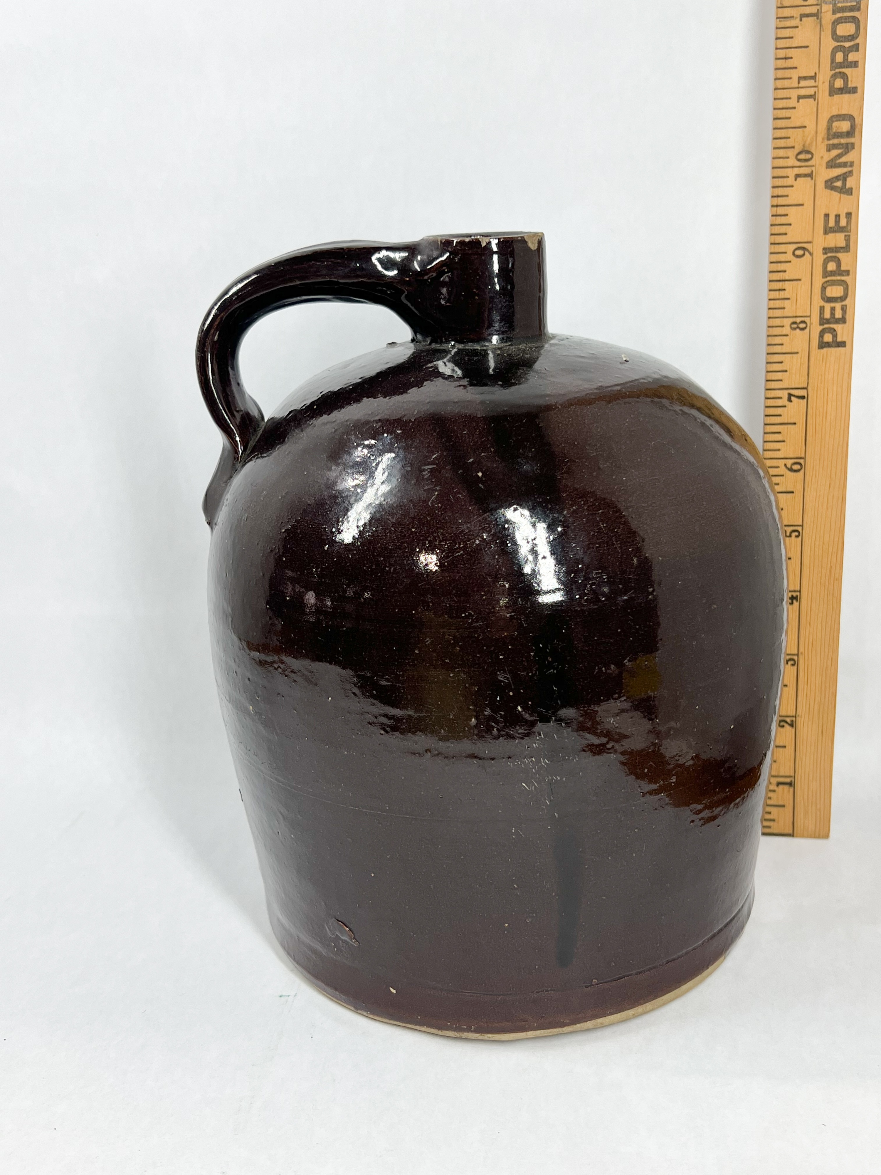TWO ANTIQUE STONEWARE WHISKEY JUGS