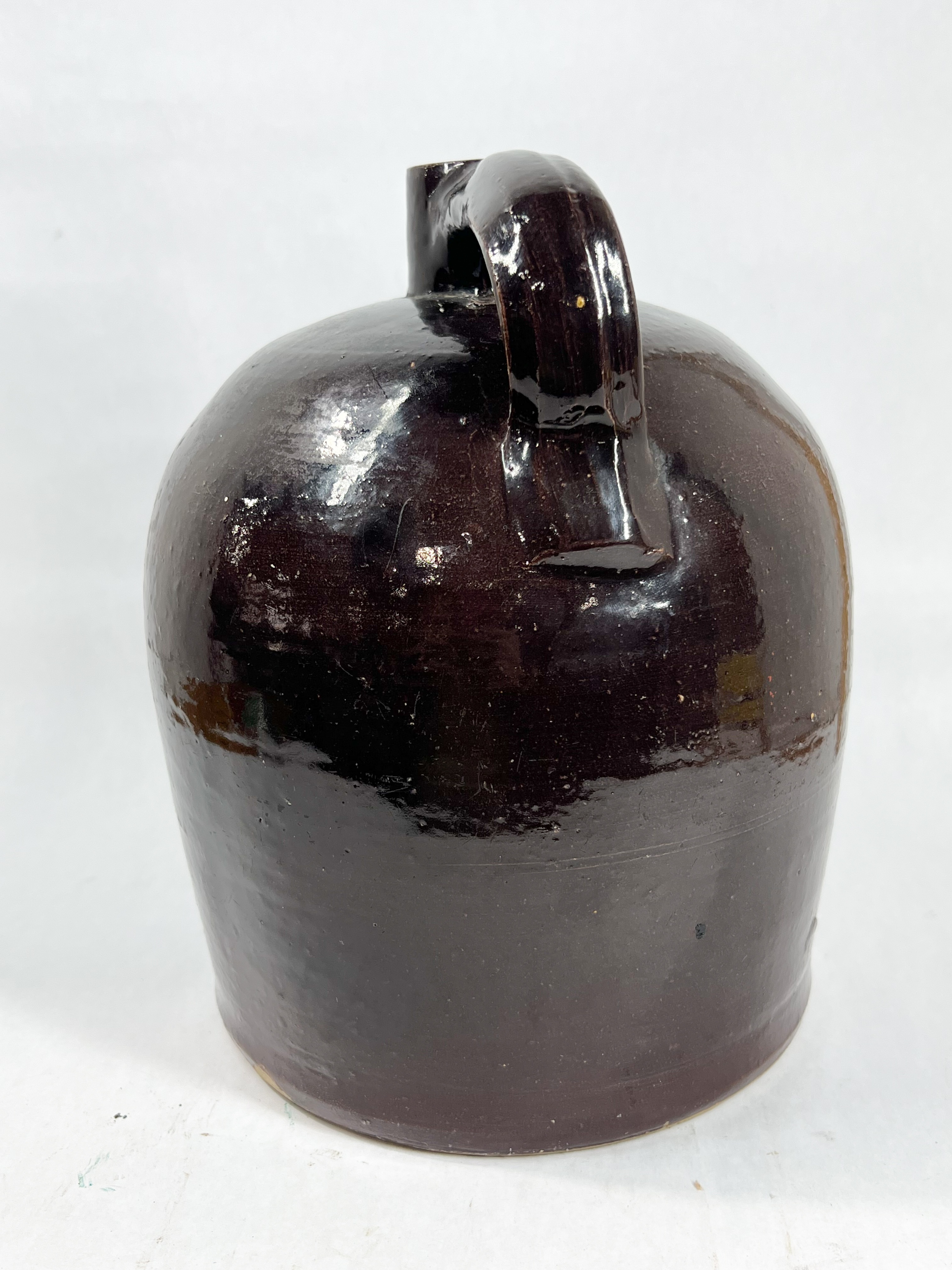 TWO ANTIQUE STONEWARE WHISKEY JUGS